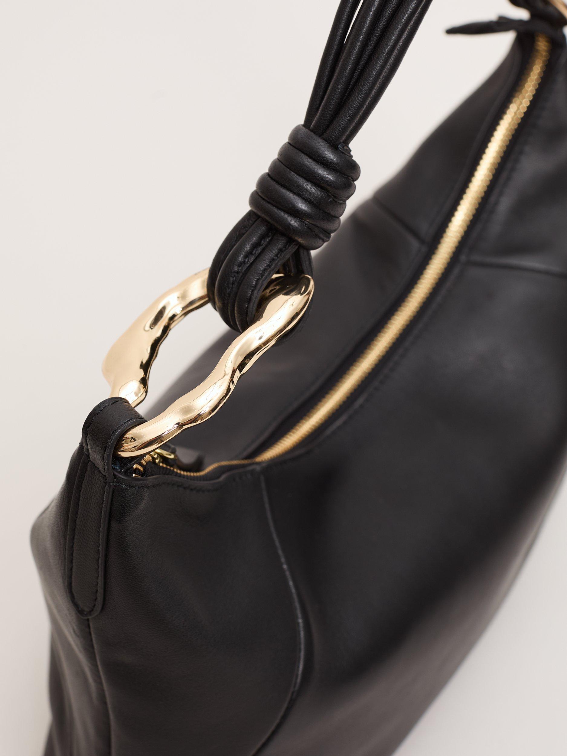 Product image 3 of 7, which shows Phase Eight Leather Twisted Grab Bag, Black, One Size