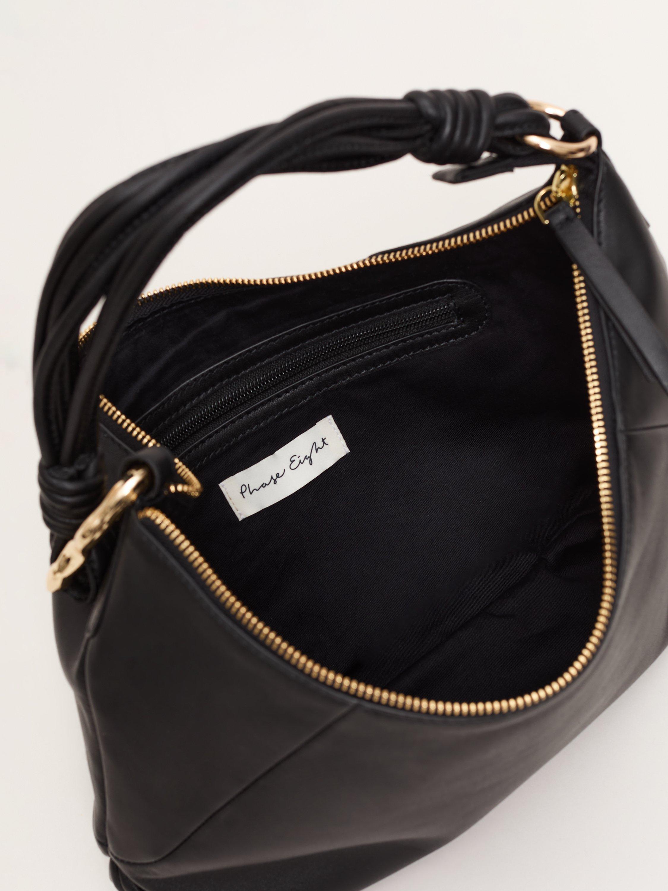 Product image 4 of 7, which shows Phase Eight Leather Twisted Grab Bag, Black, One Size