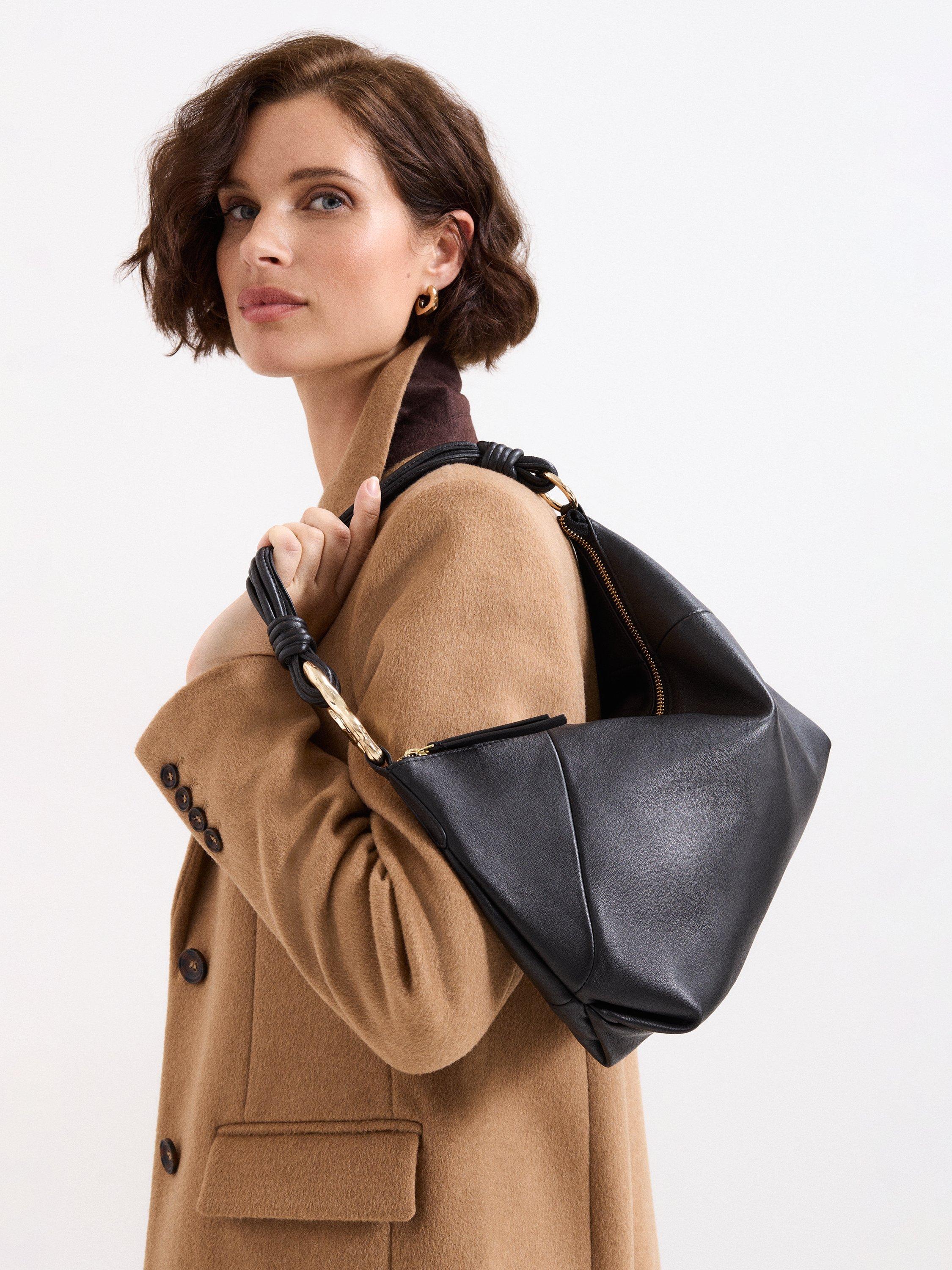 Product image 5 of 7, which shows Phase Eight Leather Twisted Grab Bag, Black, One Size