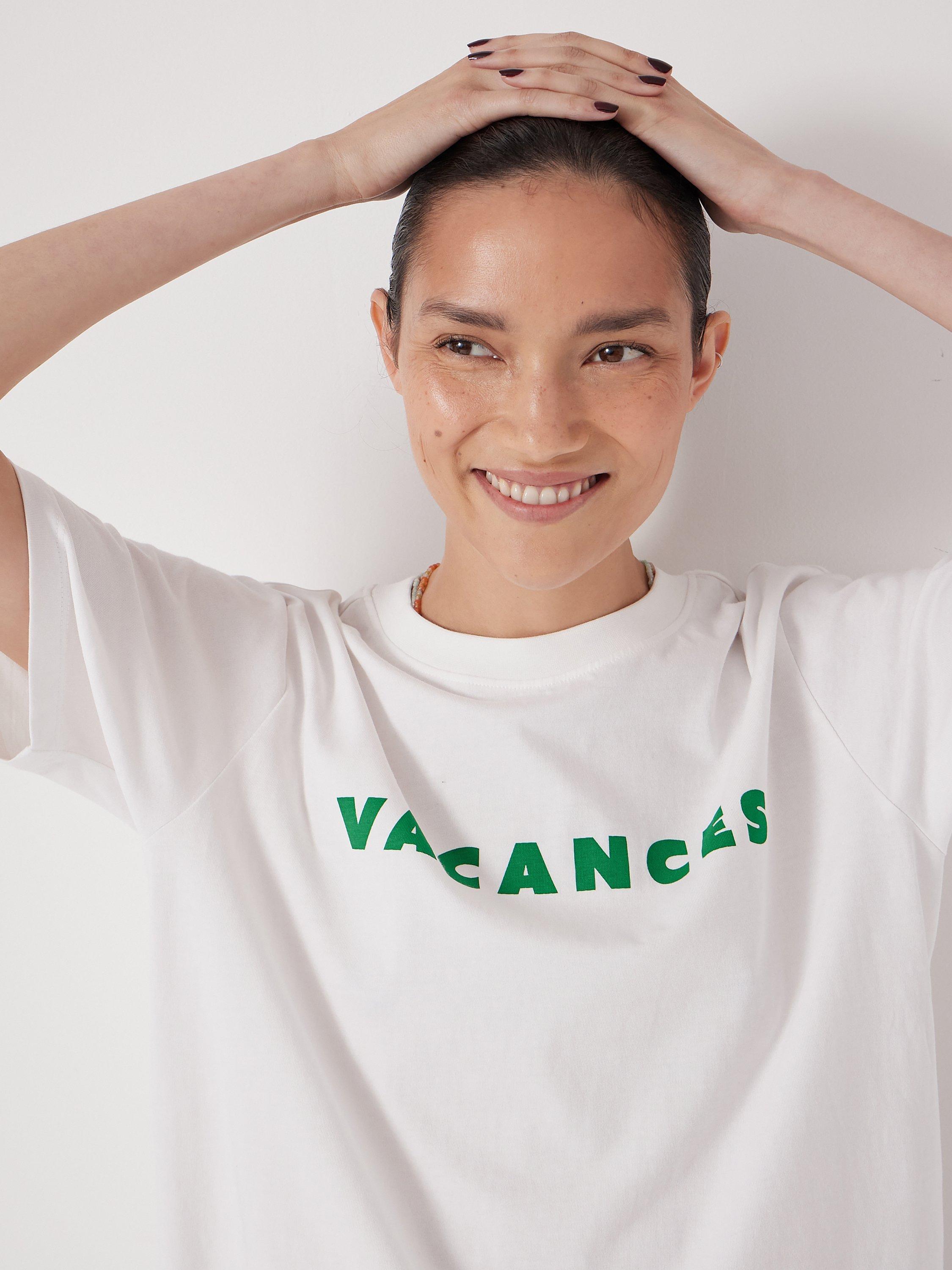 Product image 1 of 6, which shows HUSH Vacances Graphic T-Shirt, White, XXS
