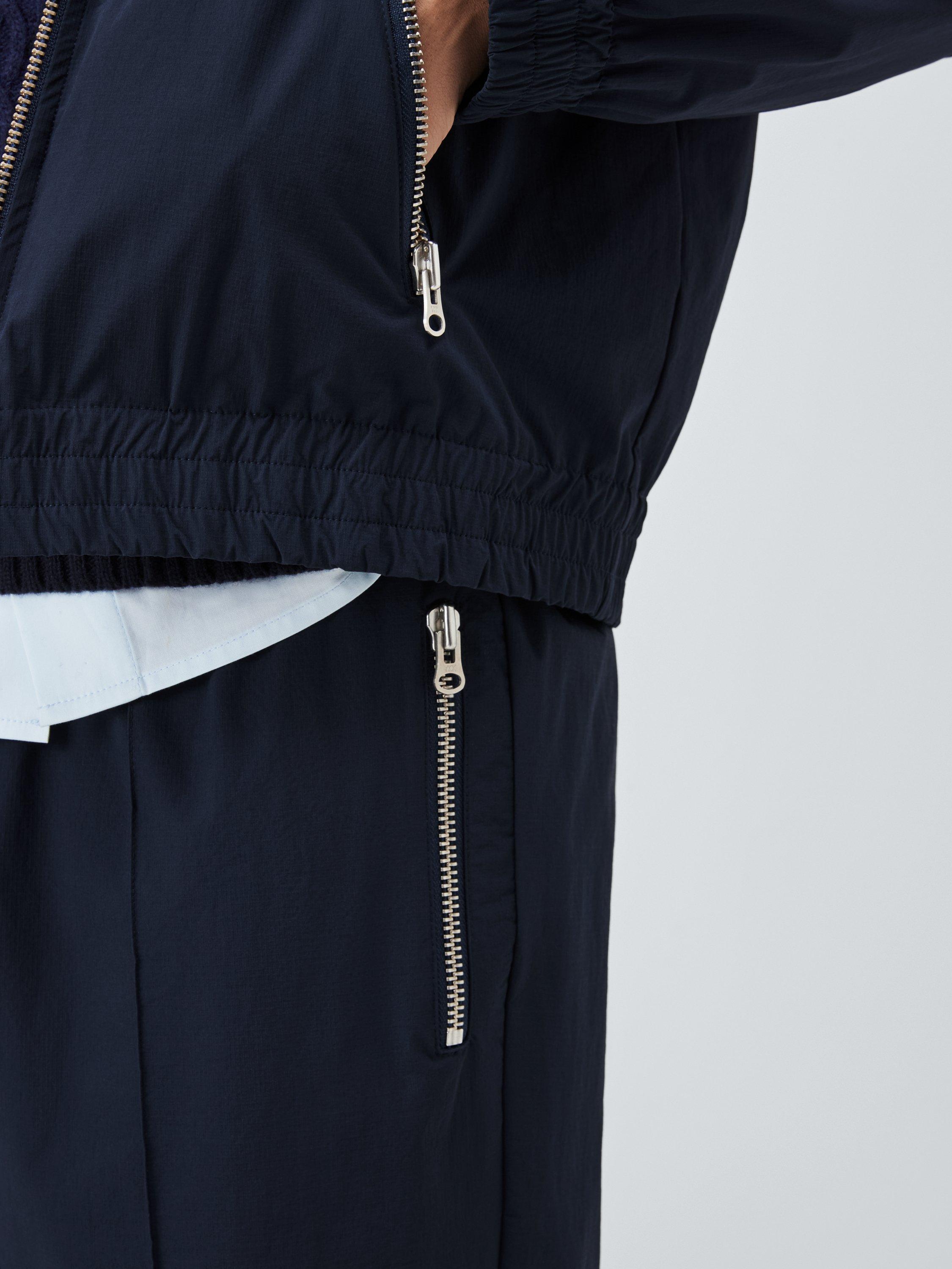 Product image 5 of 6, which shows John Lewis x LABRUM Tech Track Joggers, Navy, S