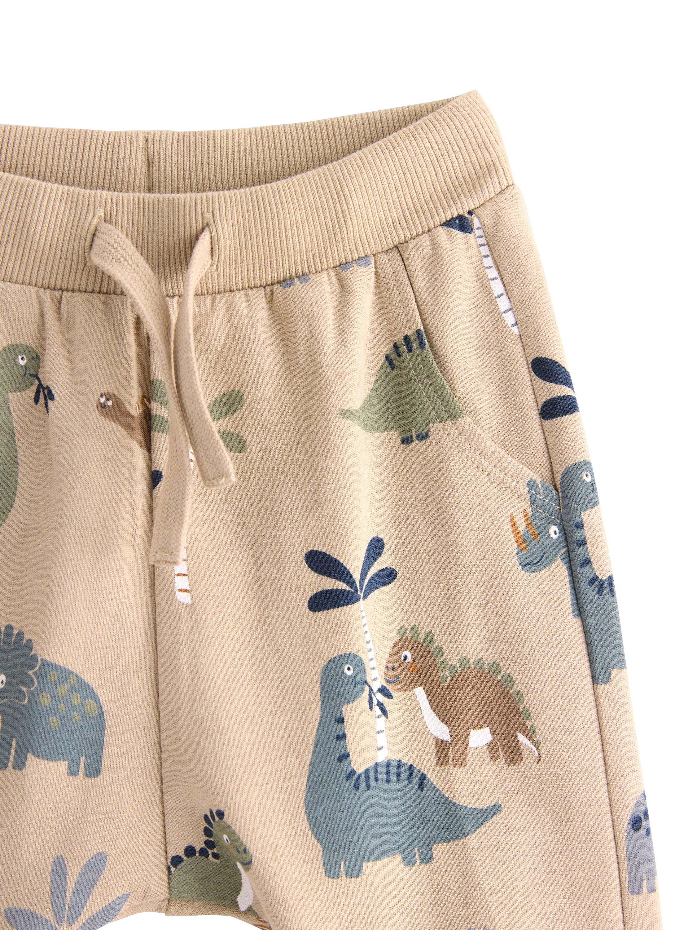 Product image 3 of 3, which shows Lindex Baby Dinosaur Joggers, Beige, 4-6 months