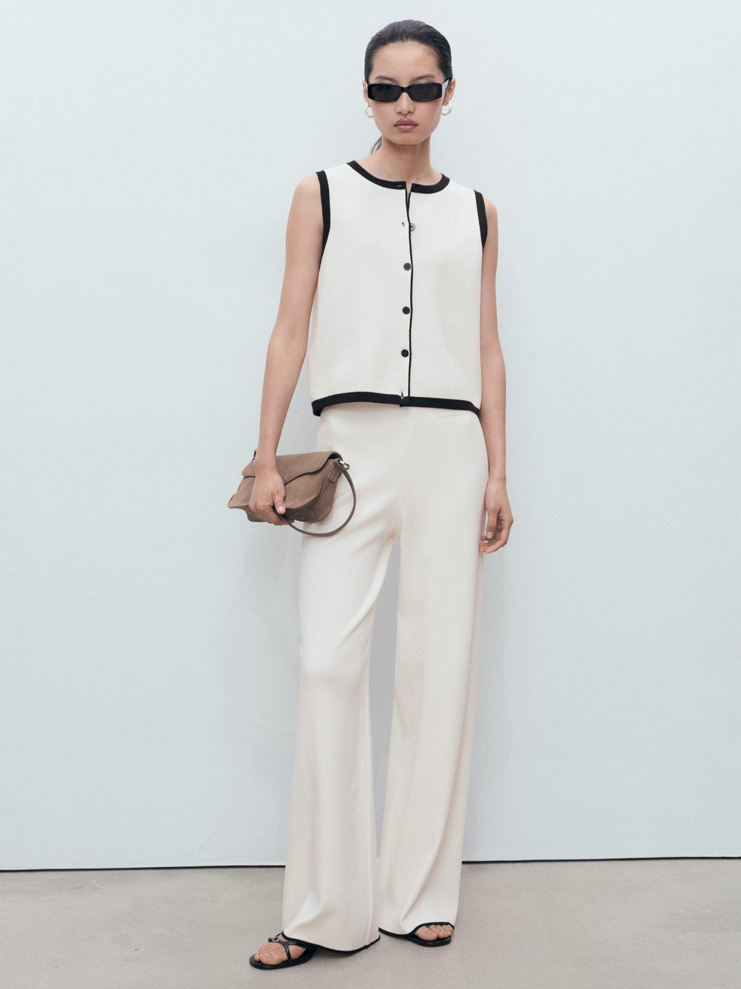 Product image 2 of 9, which shows Mango Pipon Colour Contrast Flared Trousers, Cream, XS
