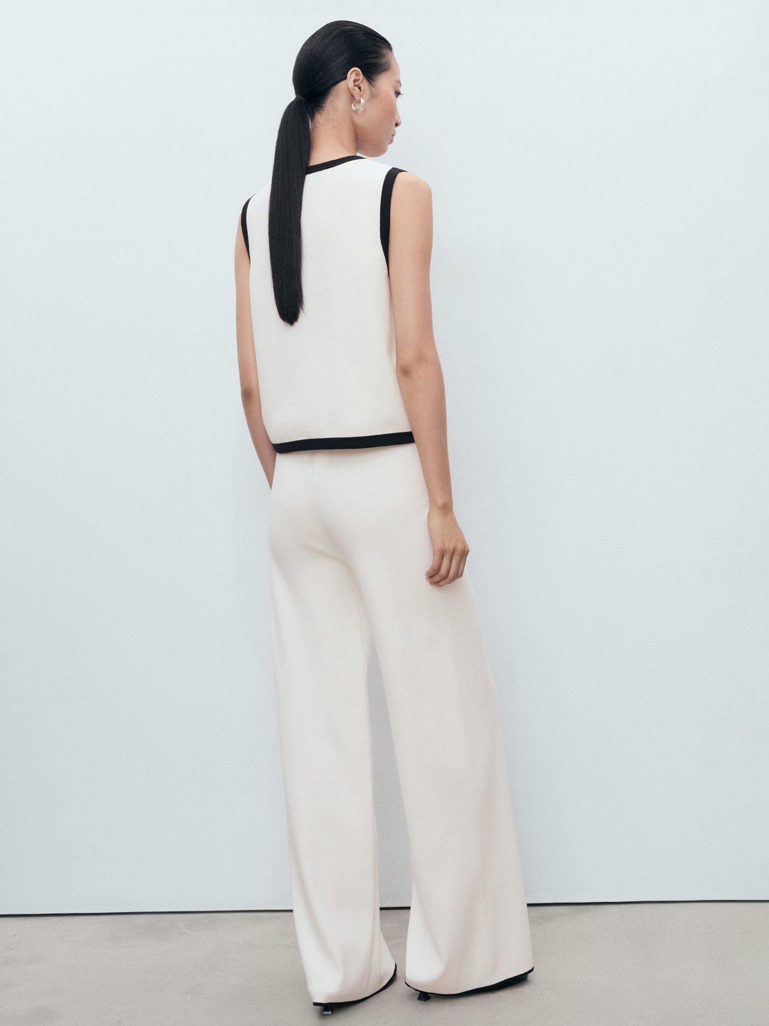 Product image 4 of 9, which shows Mango Pipon Colour Contrast Flared Trousers, Cream, XS