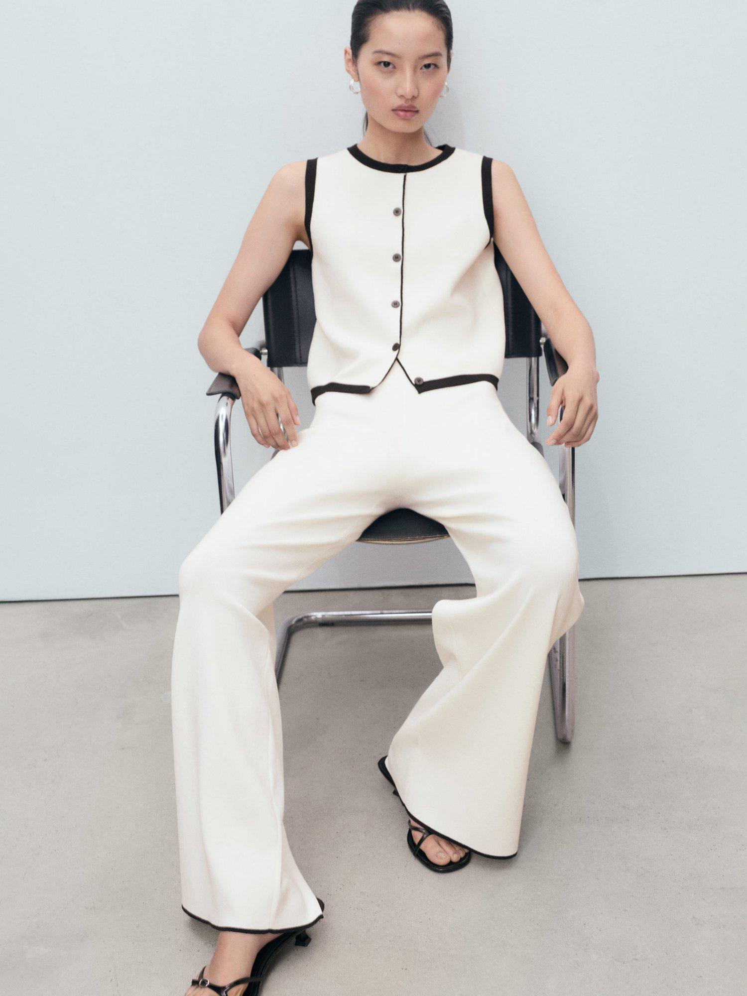 Product image 7 of 9, which shows Mango Pipon Colour Contrast Flared Trousers, Cream, XS