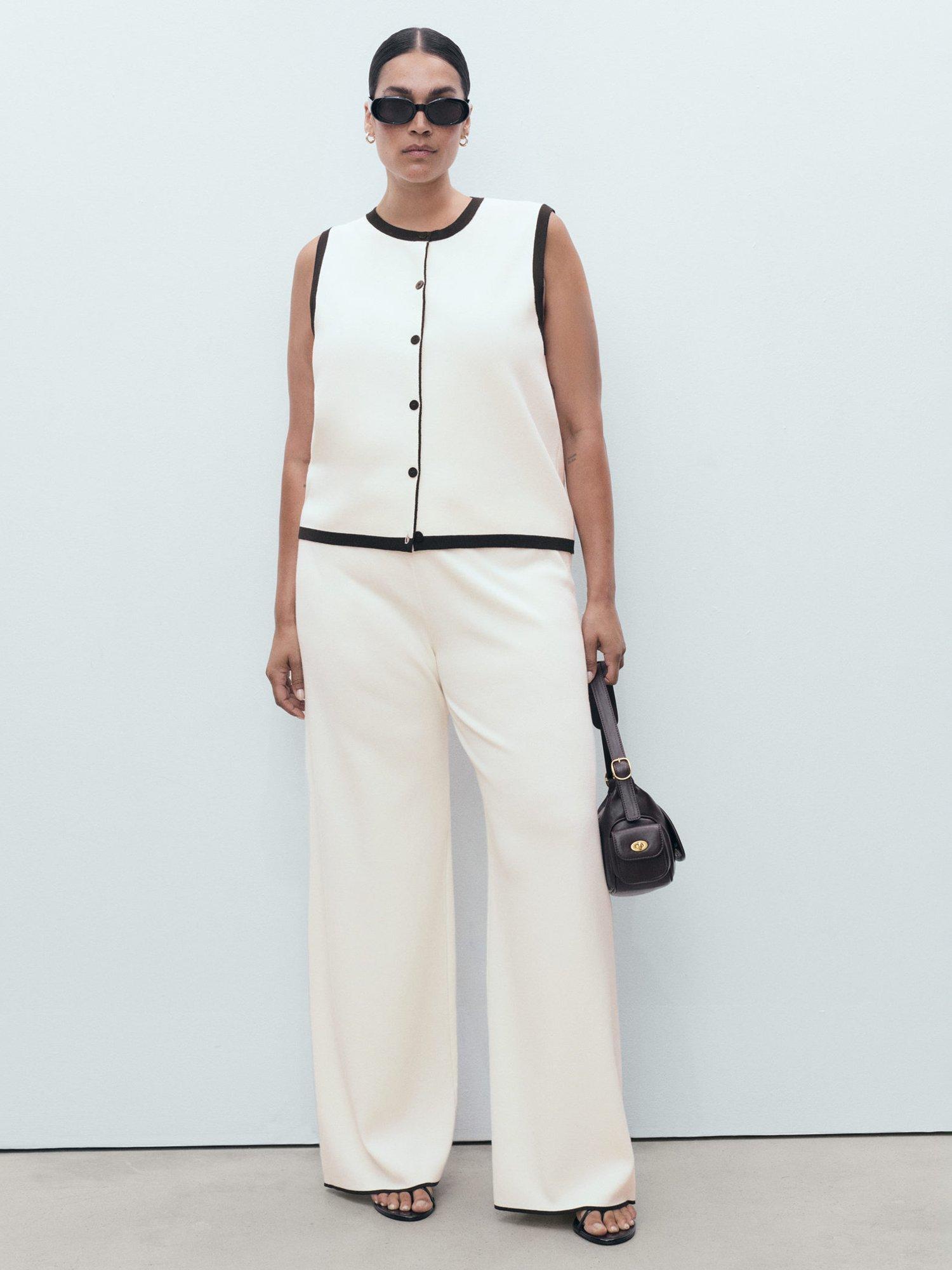 Product image 8 of 9, which shows Mango Pipon Colour Contrast Flared Trousers, Cream, XS
