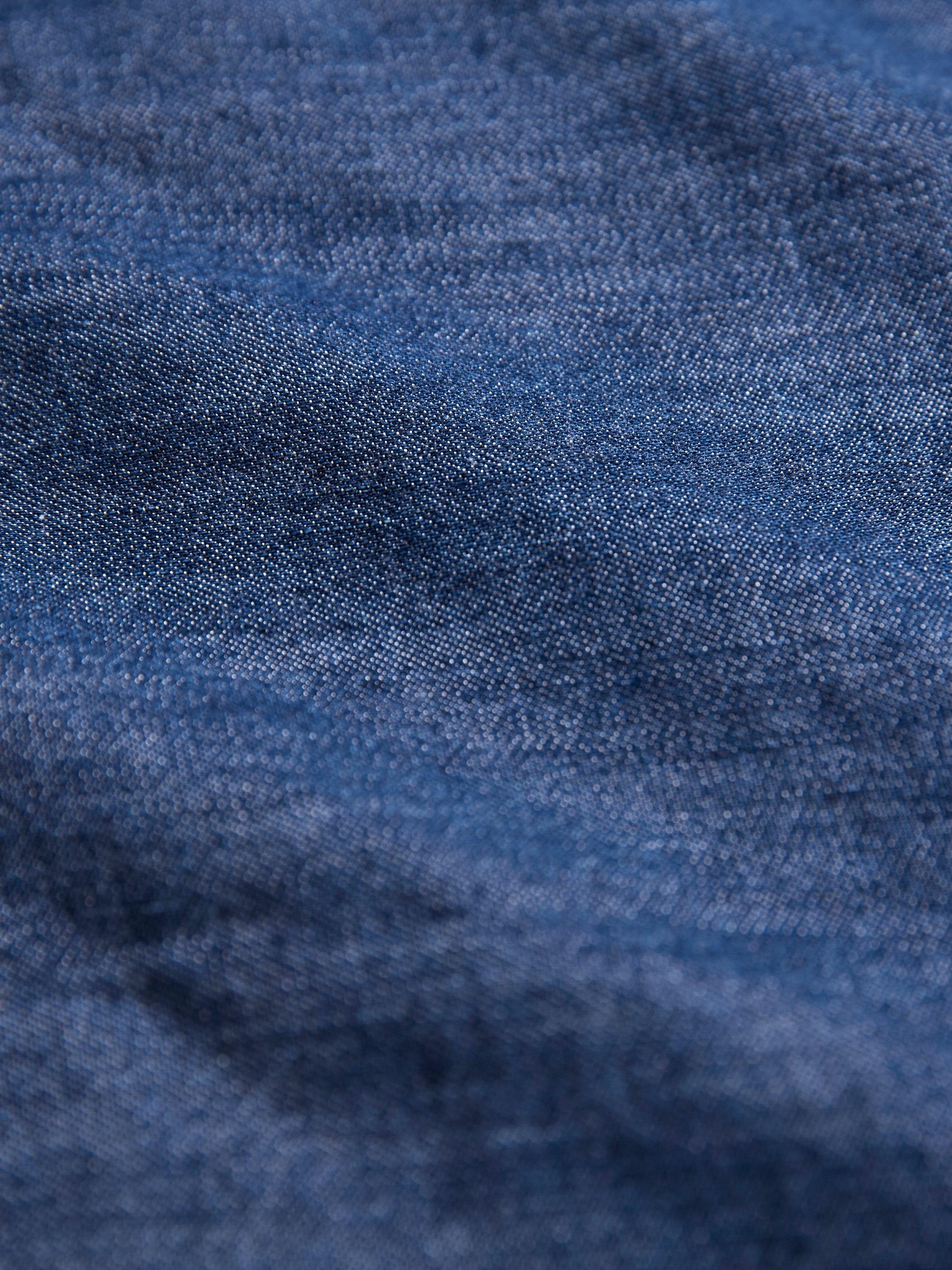 Product image 4 of 8, which shows Celtic & Co. Curved Hem Shirt, Indigo Mid Wash, 8