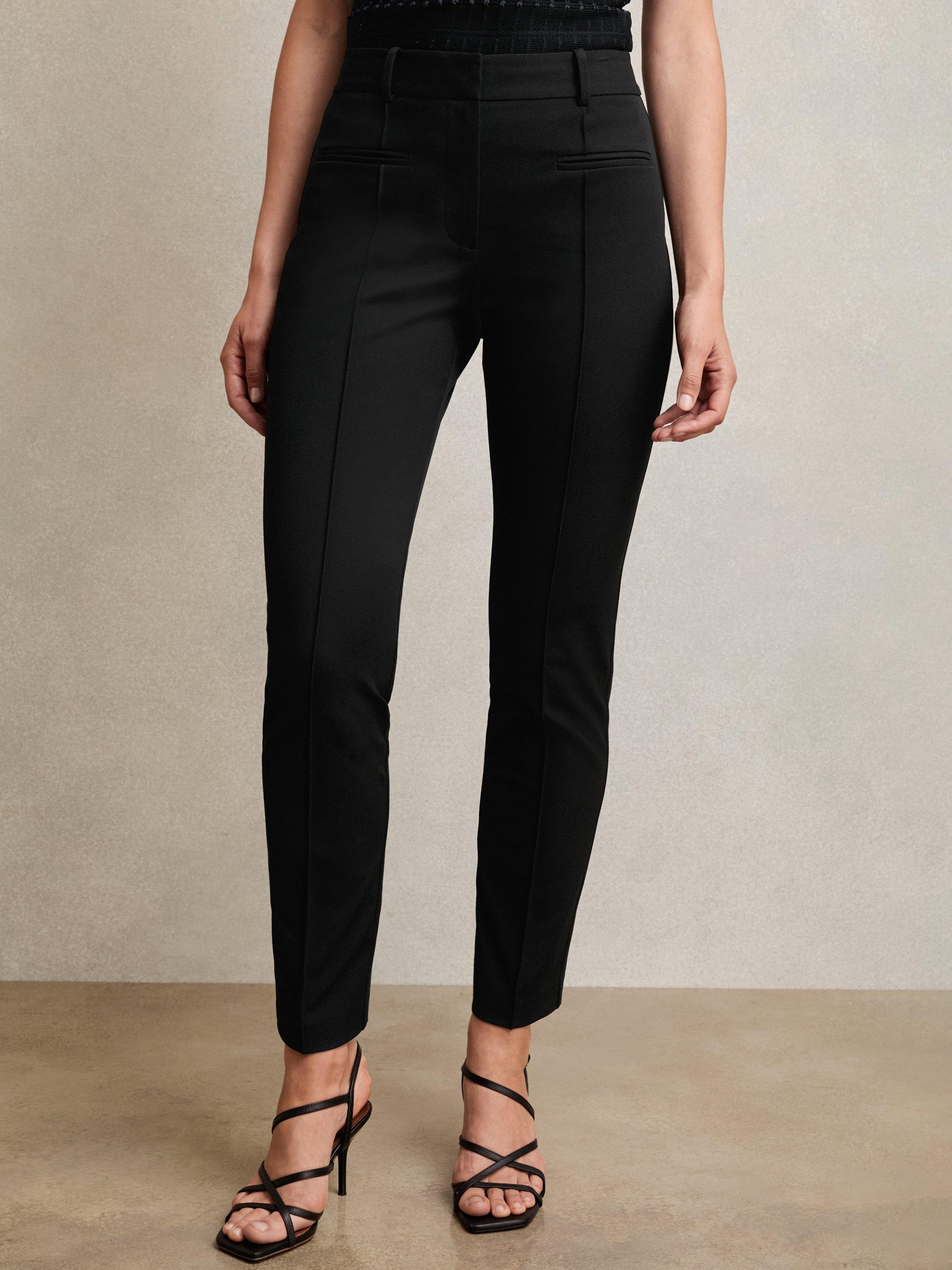 Product image 1 of 5, which shows Reiss Petite Norla Taper Trousers, Black, 6Pt