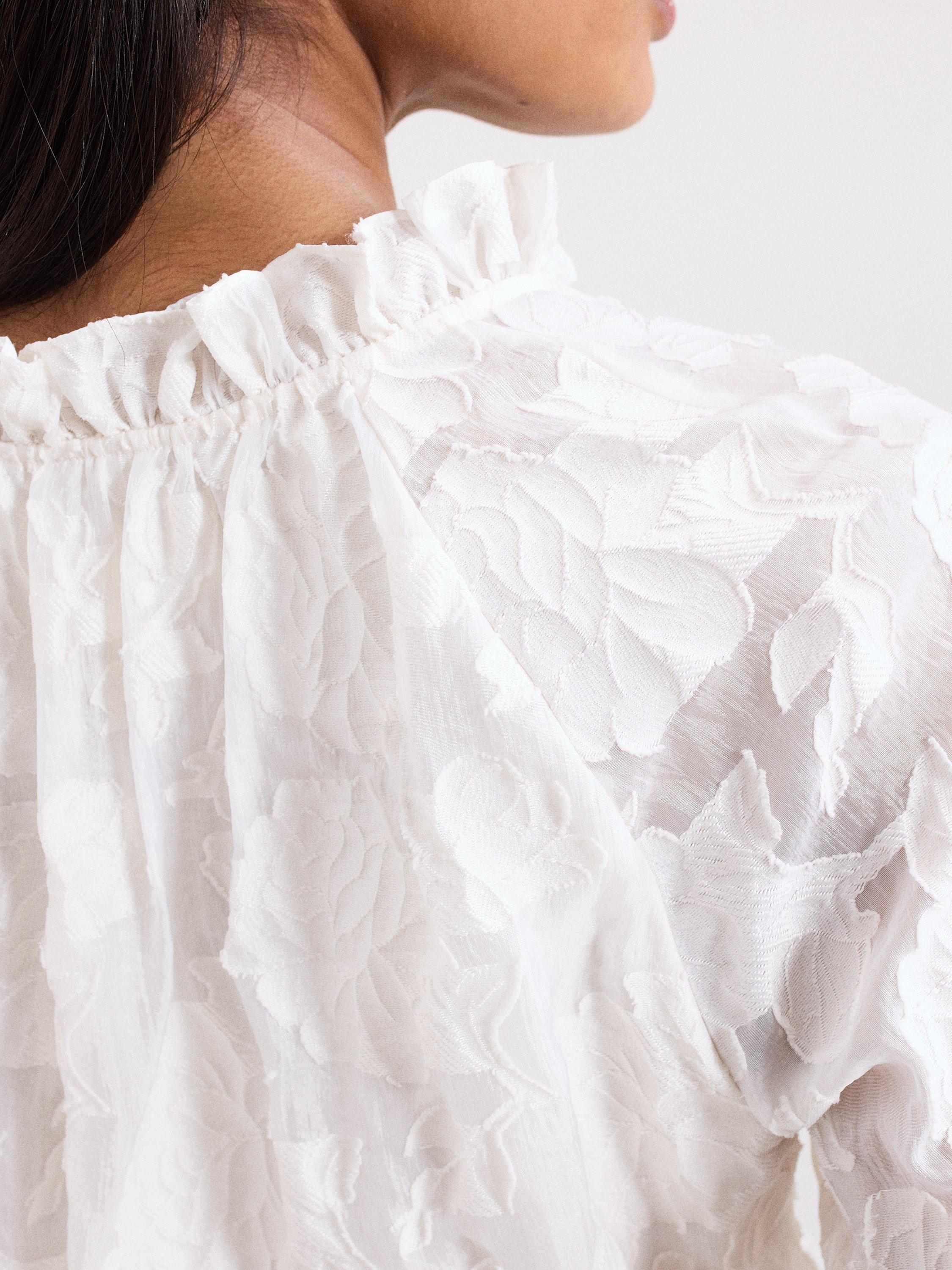 Product image 7 of 8, which shows Phase Eight Amal Floral Textured Blouse, Cream, 10