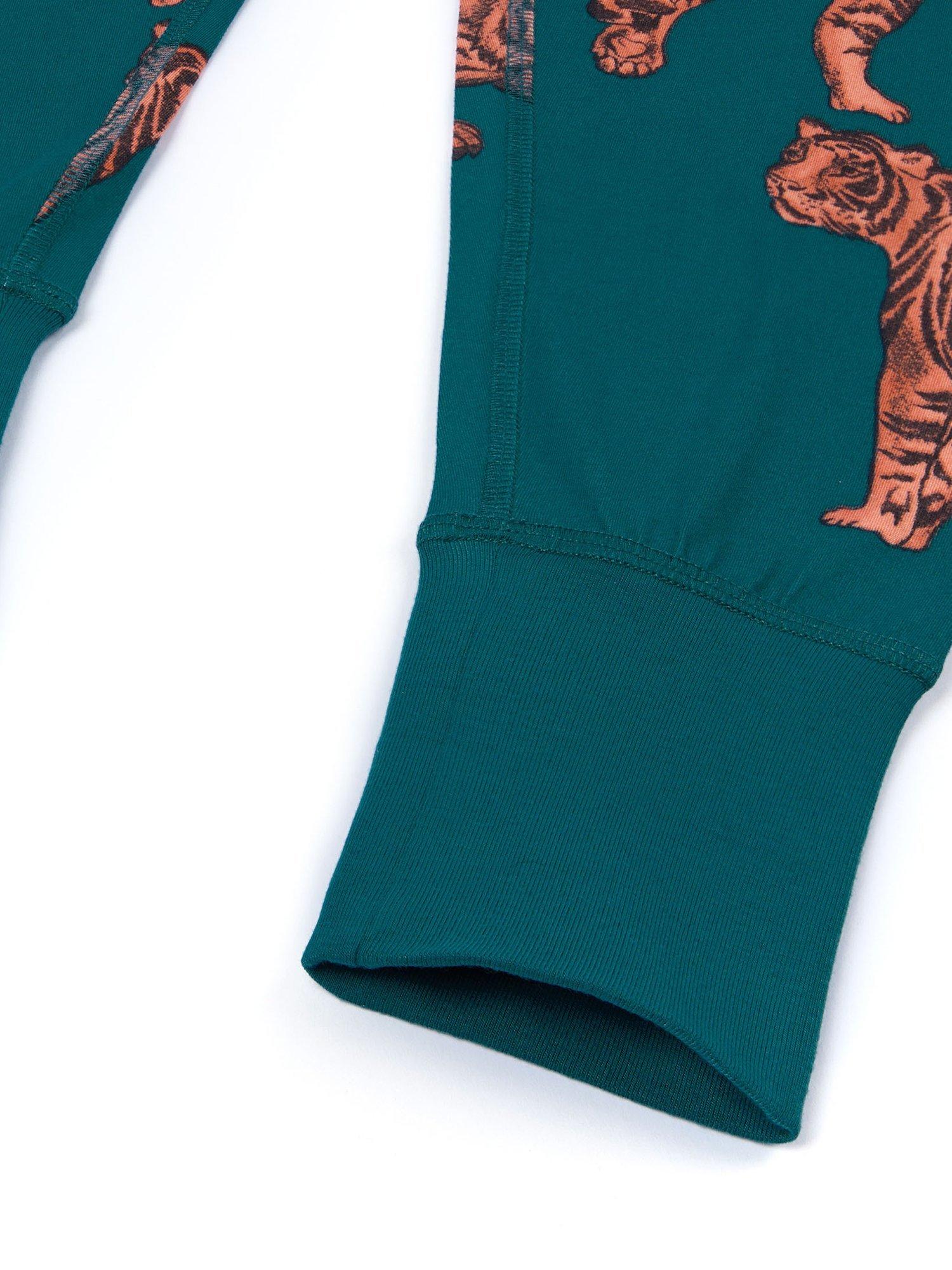 Product image 2 of 2, which shows Chelsea Peers Kids' Long Sleeved Tiger Print Pyjamas, Teal, 1-2 years