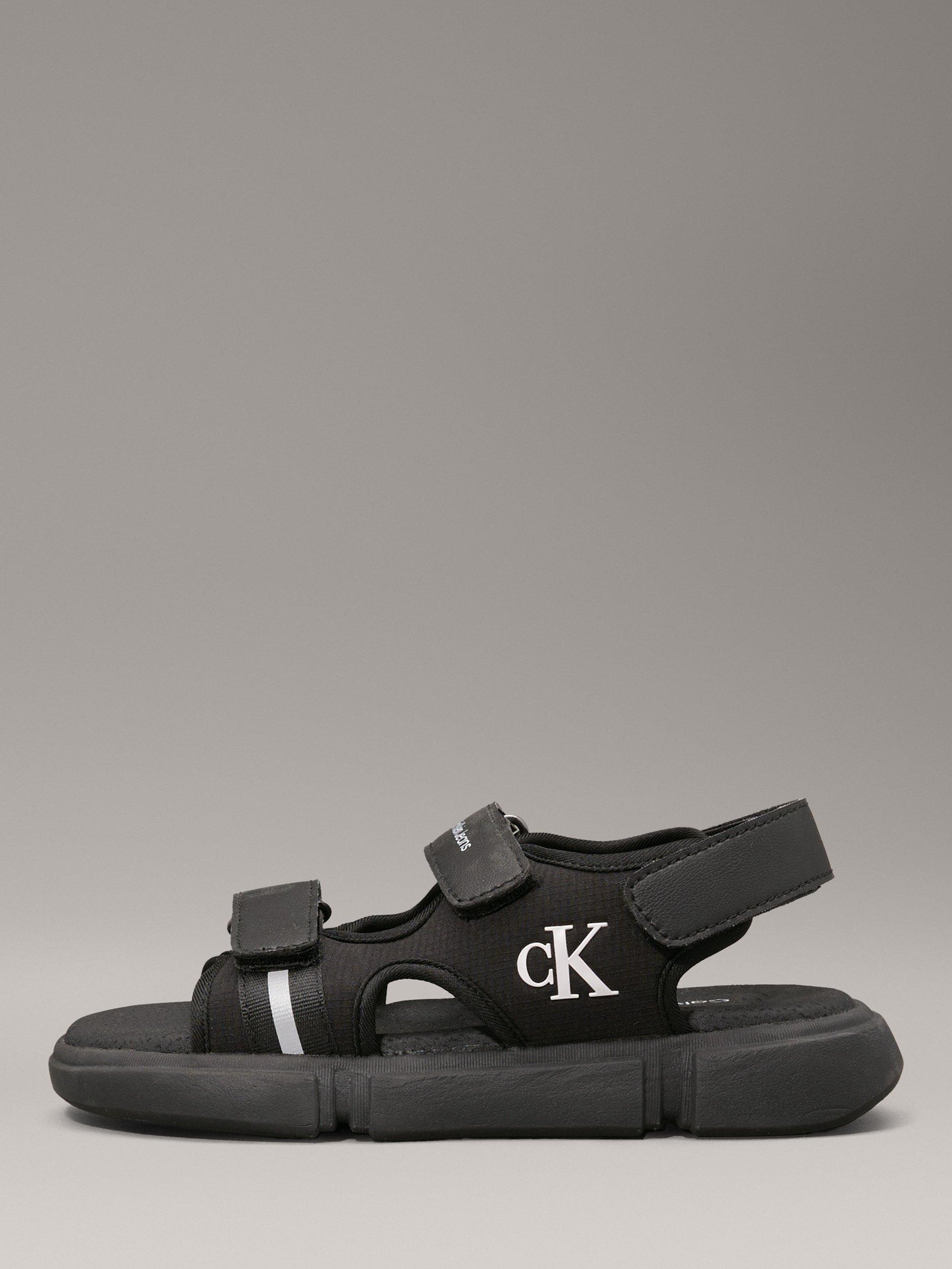 Product image 5 of 7, which shows Calvin Klein Kids' Open Toe Velcro Sandals, Black, EU30