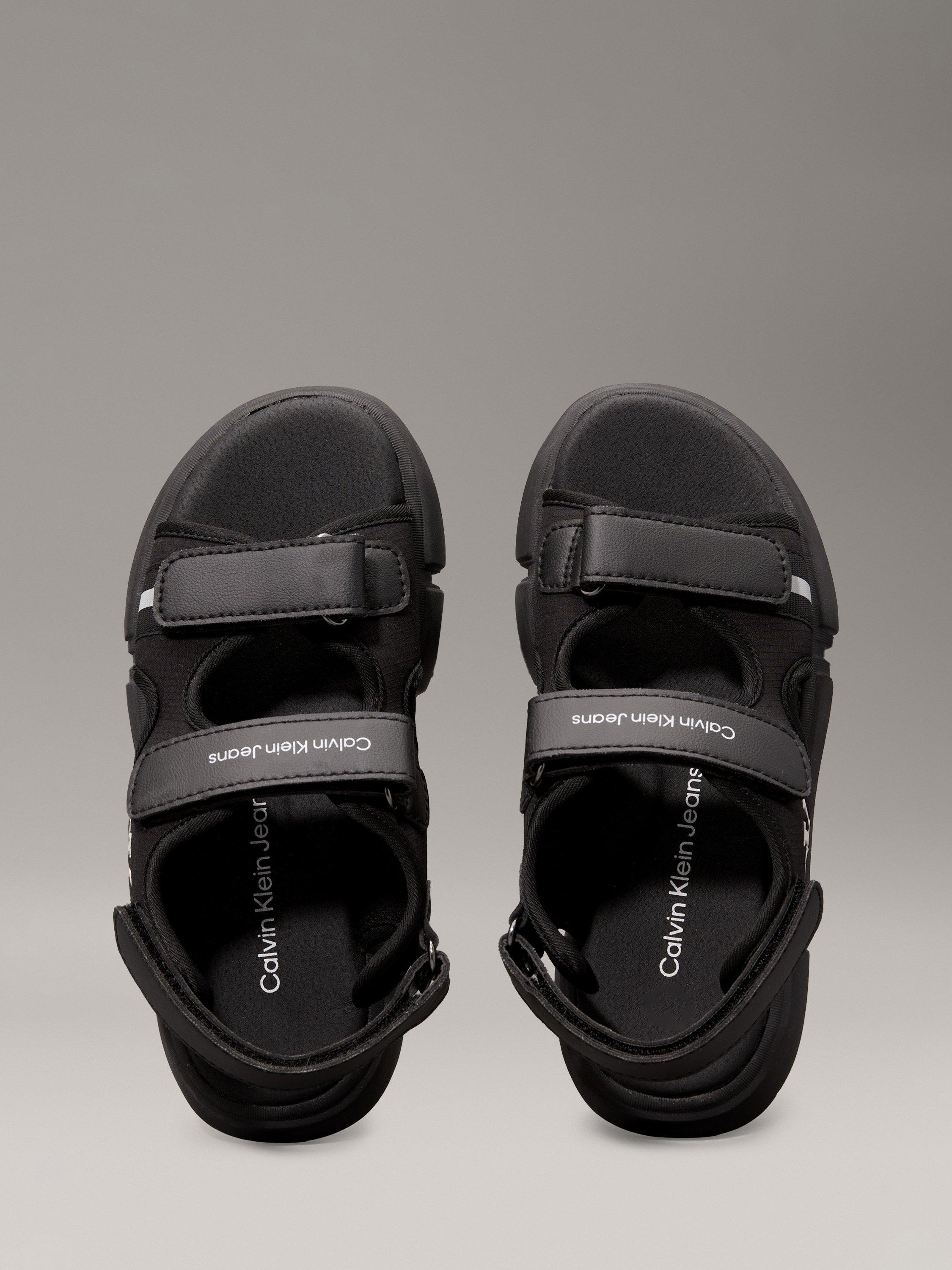 Product image 7 of 7, which shows Calvin Klein Kids' Open Toe Velcro Sandals, Black, EU30