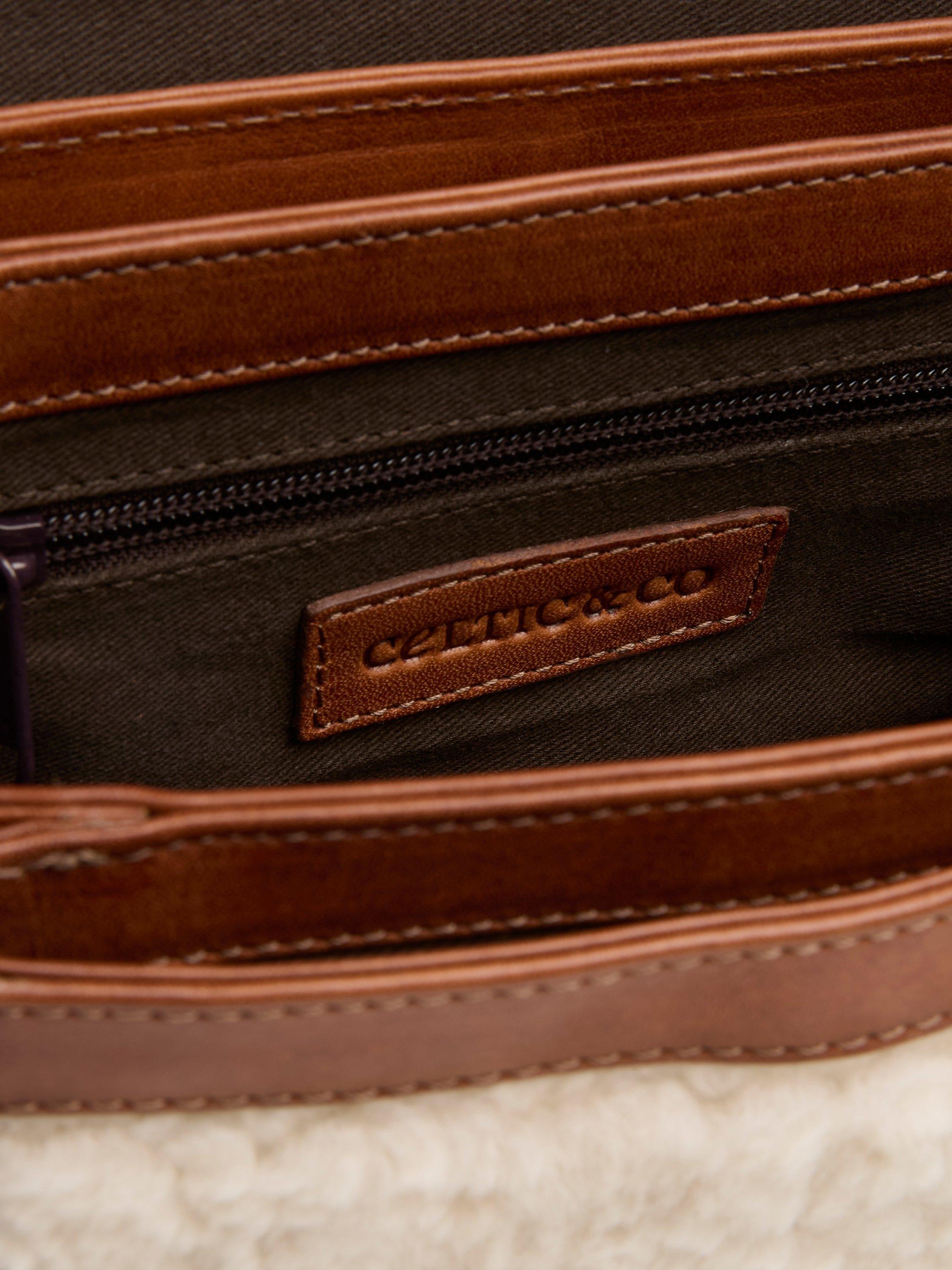 Product image 3 of 6, which shows Celtic & Co. Leather Trim Sheep Cross Body Bag, Ecru, Brown