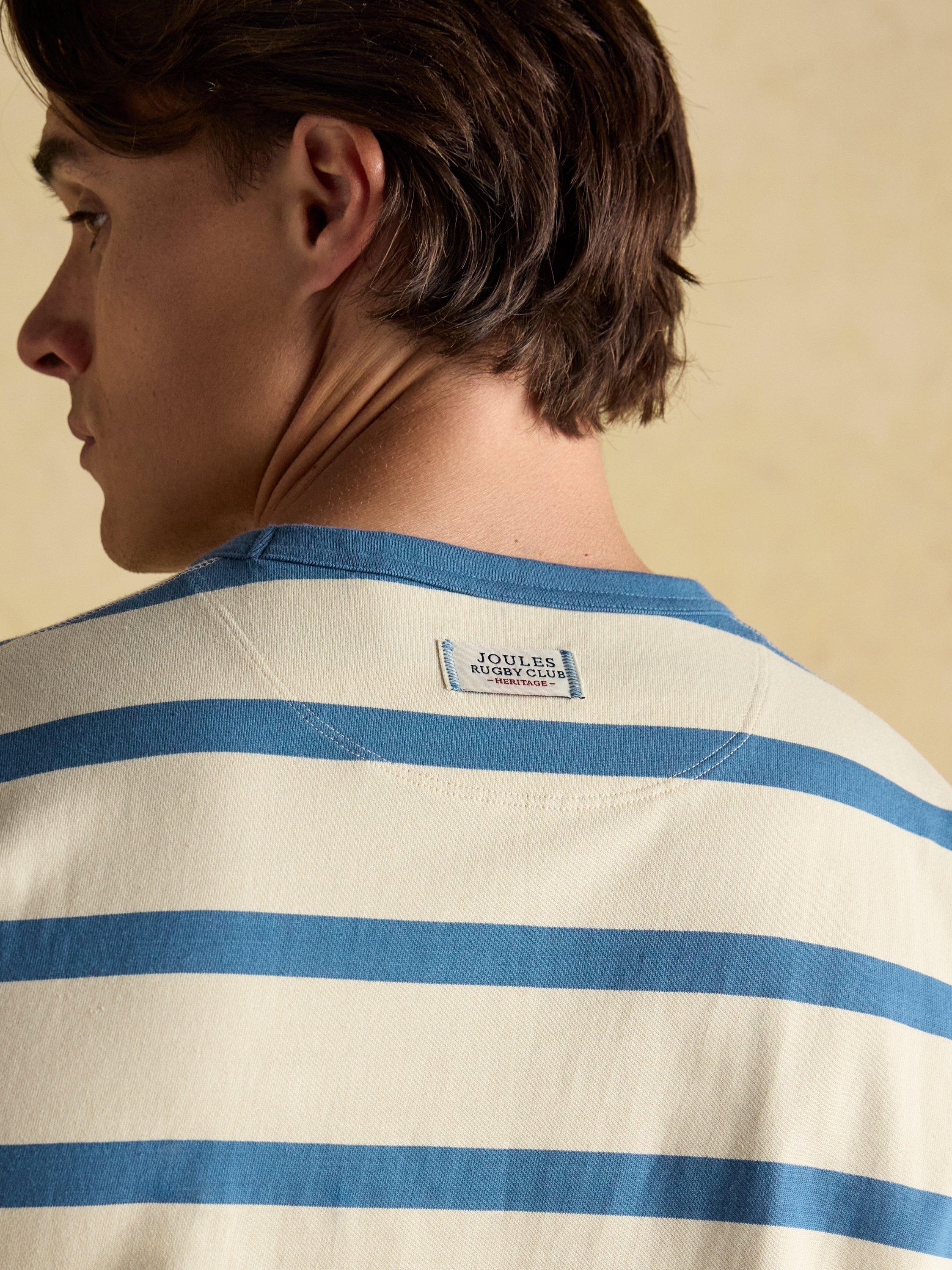 Product image 7 of 7, which shows Joules Cotton Regular Fit Short Sleeve Rugby Club T-Shirt, Cream/Blue, S