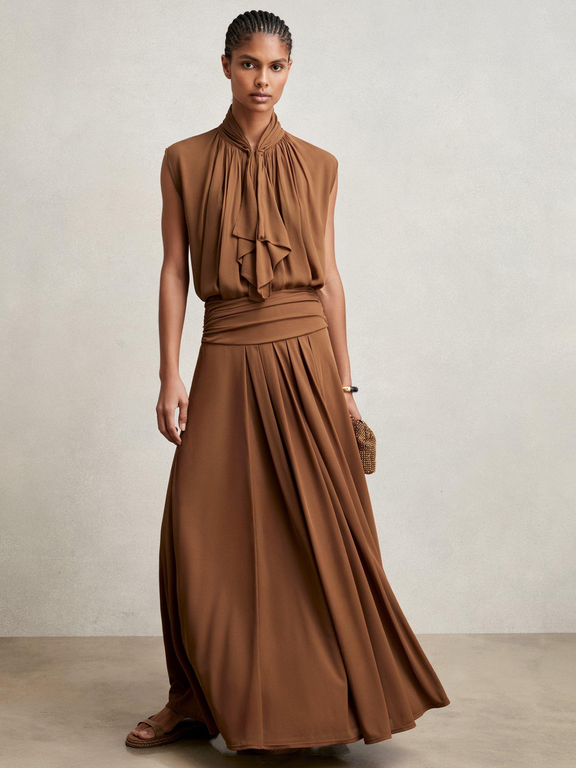 Product image 1 of 11, which shows Reiss Saffron Jersey A-Line Maxi Skirt, Tan Brown, 8