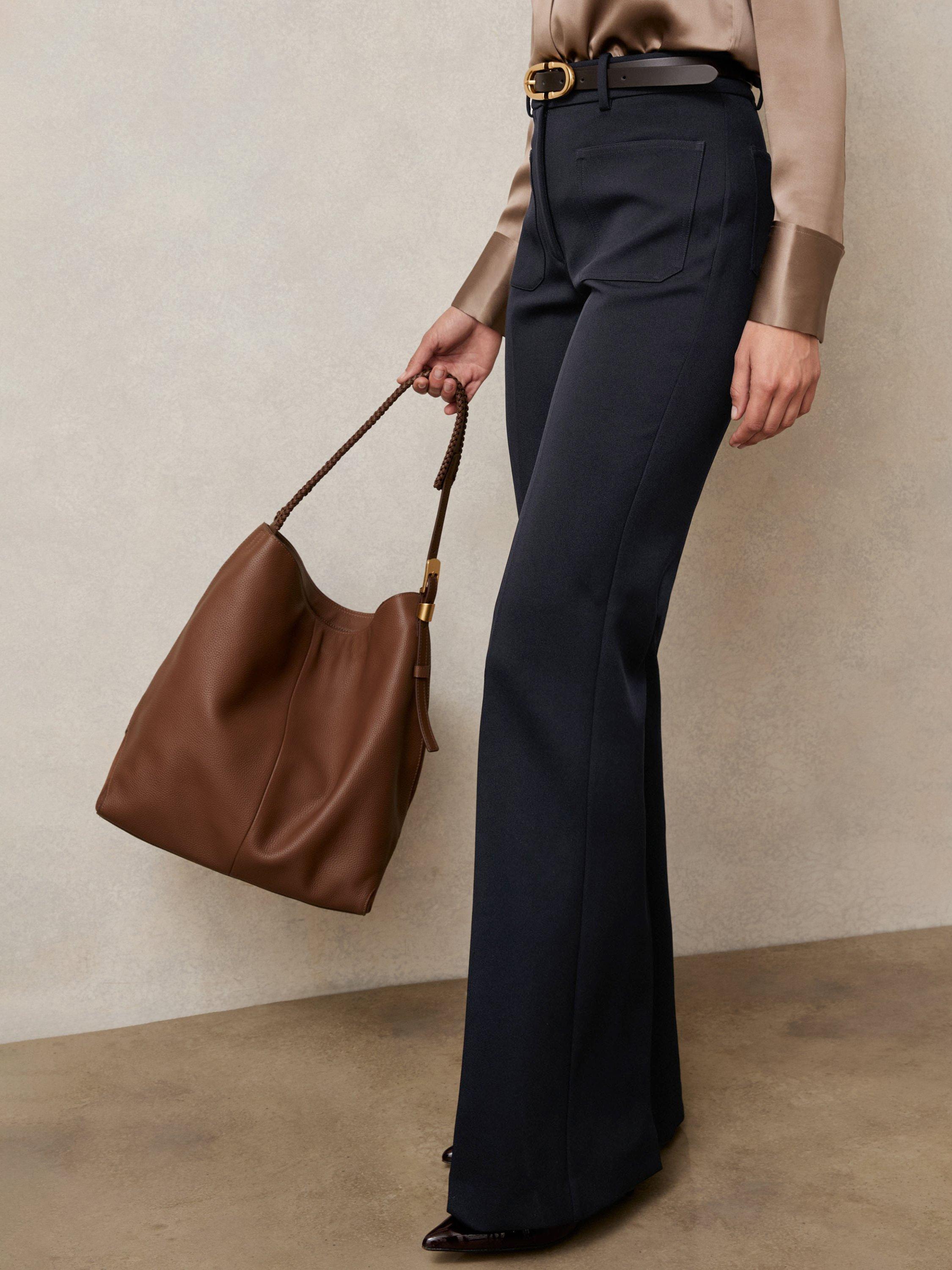 Product image 4 of 4, which shows Reiss Priya Flared Tailored Trousers, Navy, 6R