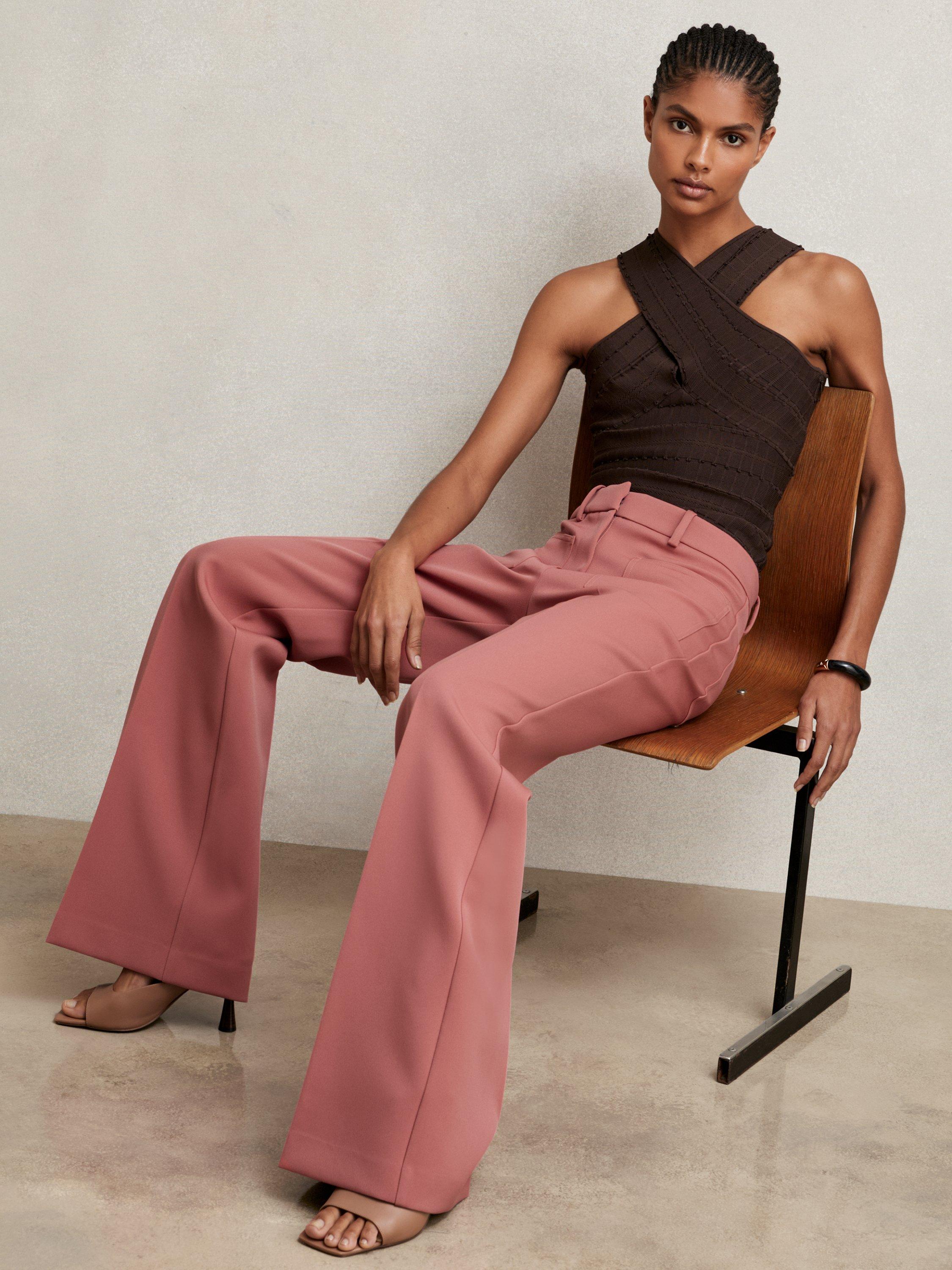 Product image 2 of 5, which shows Reiss Priya Tailored Mid Rise Flared Trousers, Pink, 14R