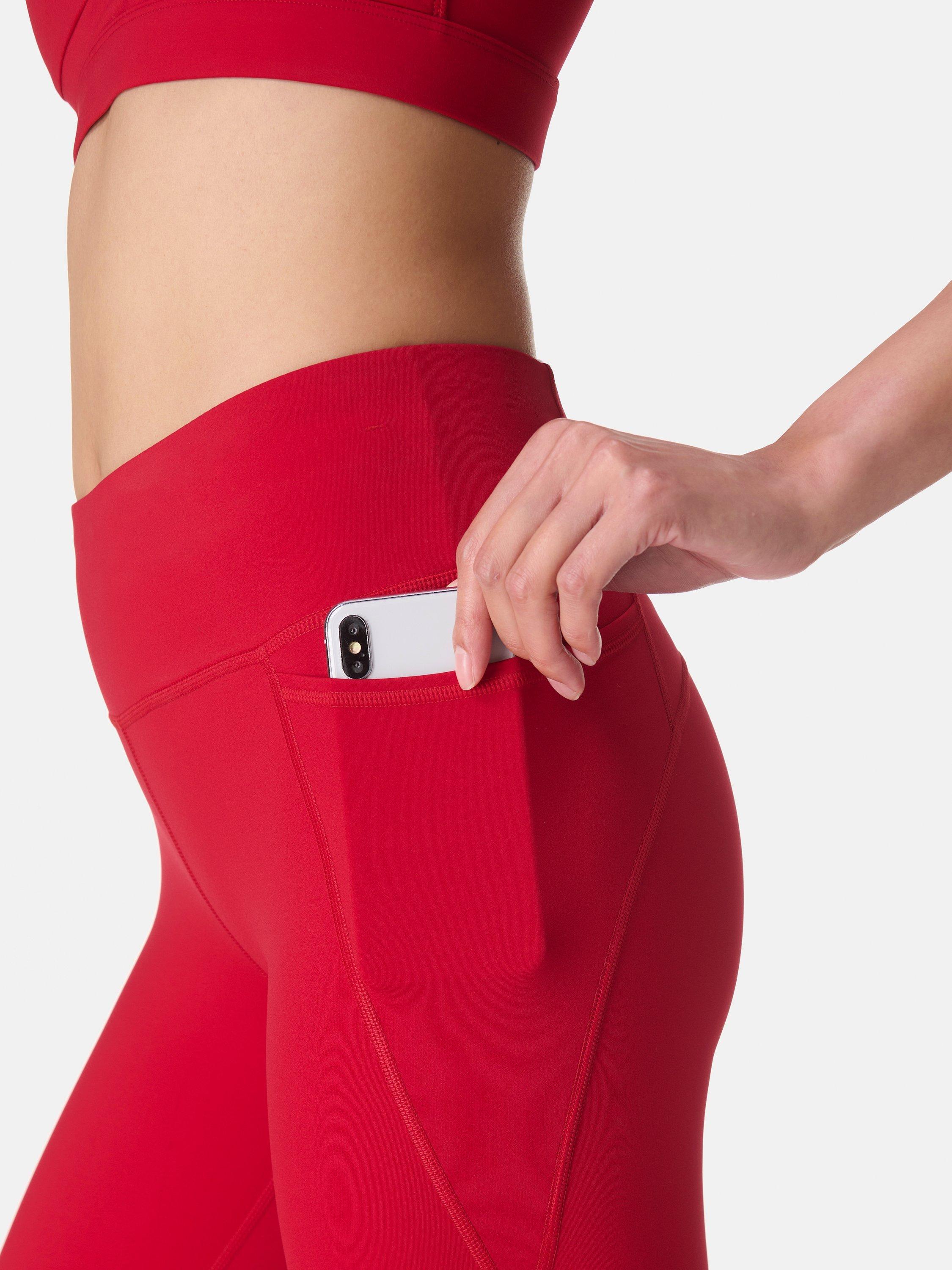 Product image 6 of 9, which shows Sweaty Betty Power 7/8 Gym Leggings, Pepper Red, XL