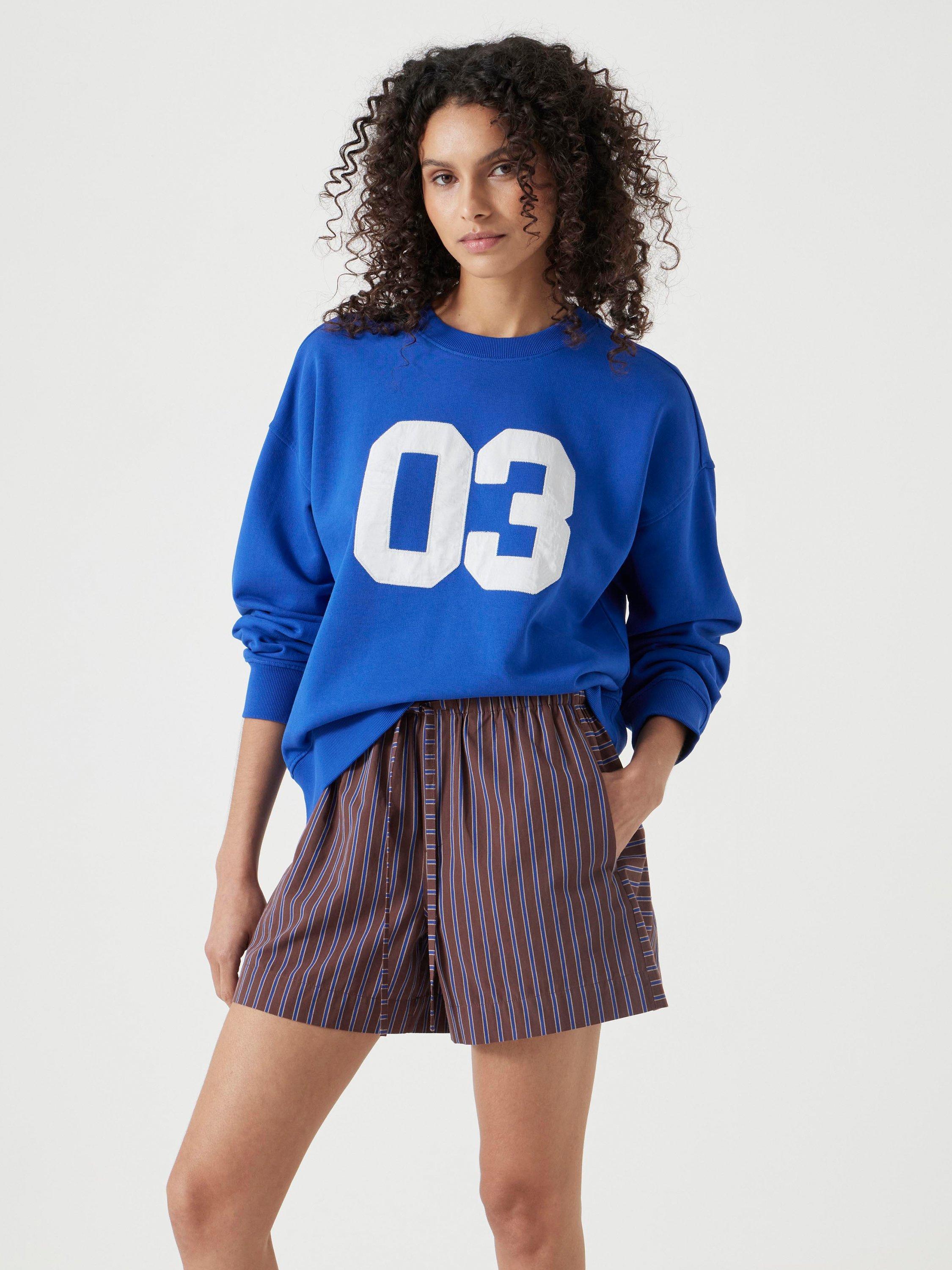 Product image 1 of 5, which shows HUSH Collegiate Graphic Sweatshirt, Blue/Multi, L