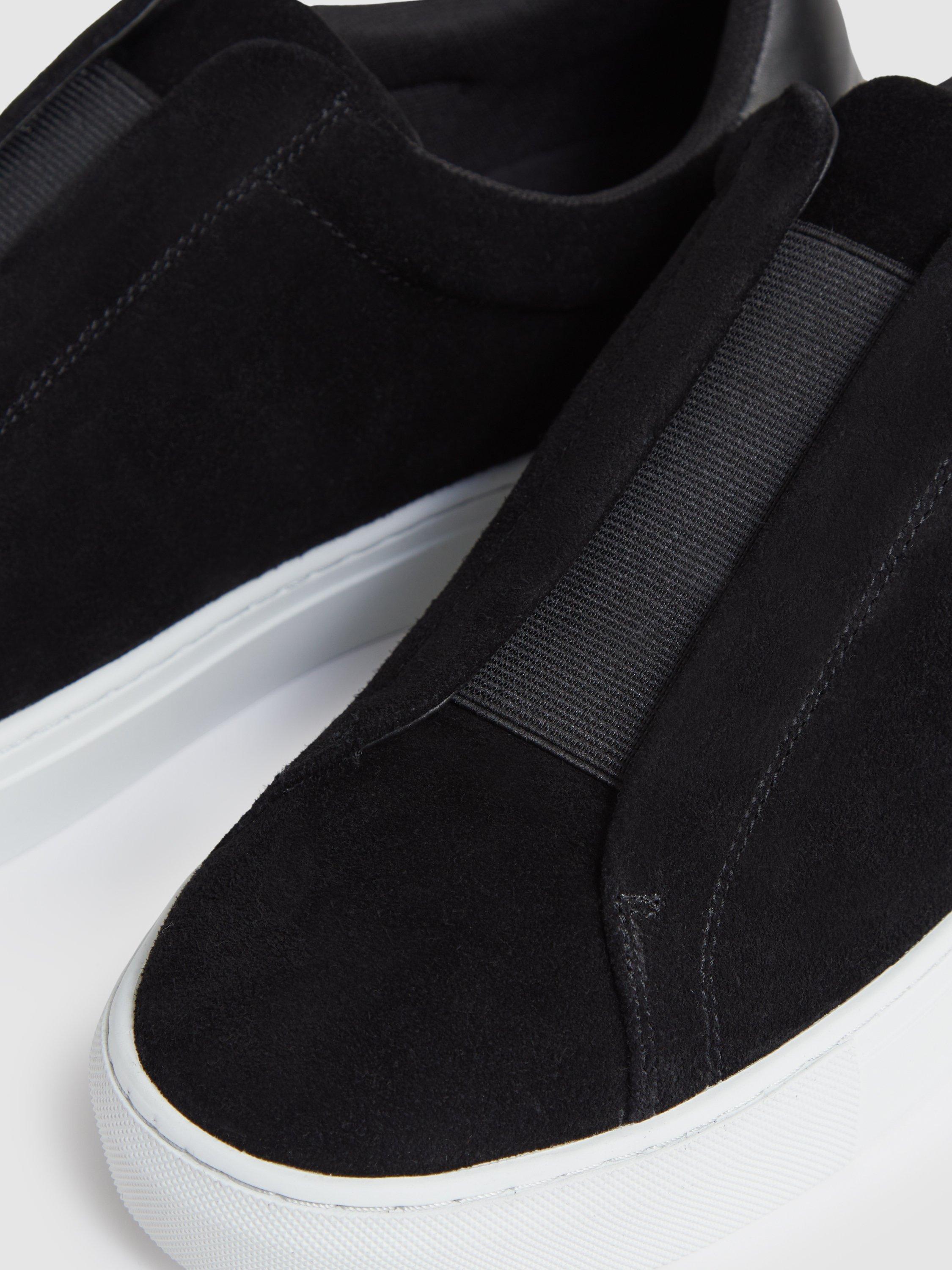 Product image 2 of 5, which shows Reiss Emil Slip On Suede Trainers, Black, 7