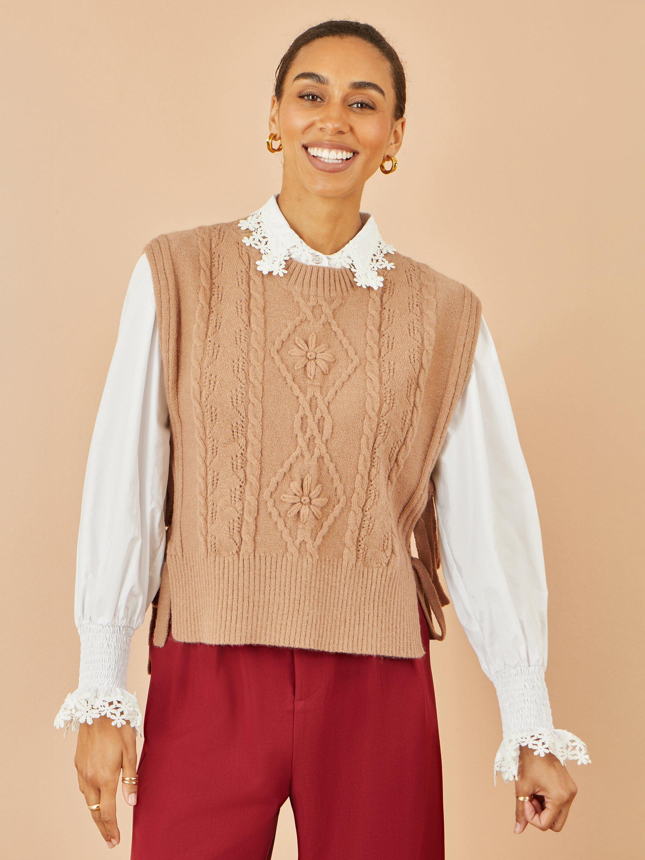 Product image 1 of 6, which shows Yumi Flower Print Cable Knit Tie Side Pullover, Camel, S