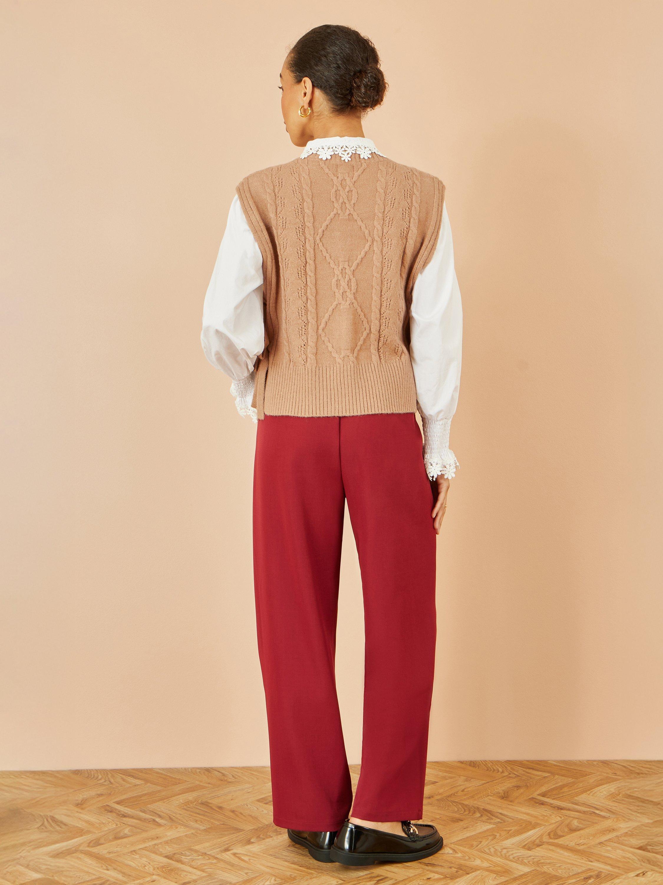 Product image 4 of 6, which shows Yumi Flower Print Cable Knit Tie Side Pullover, Camel, S