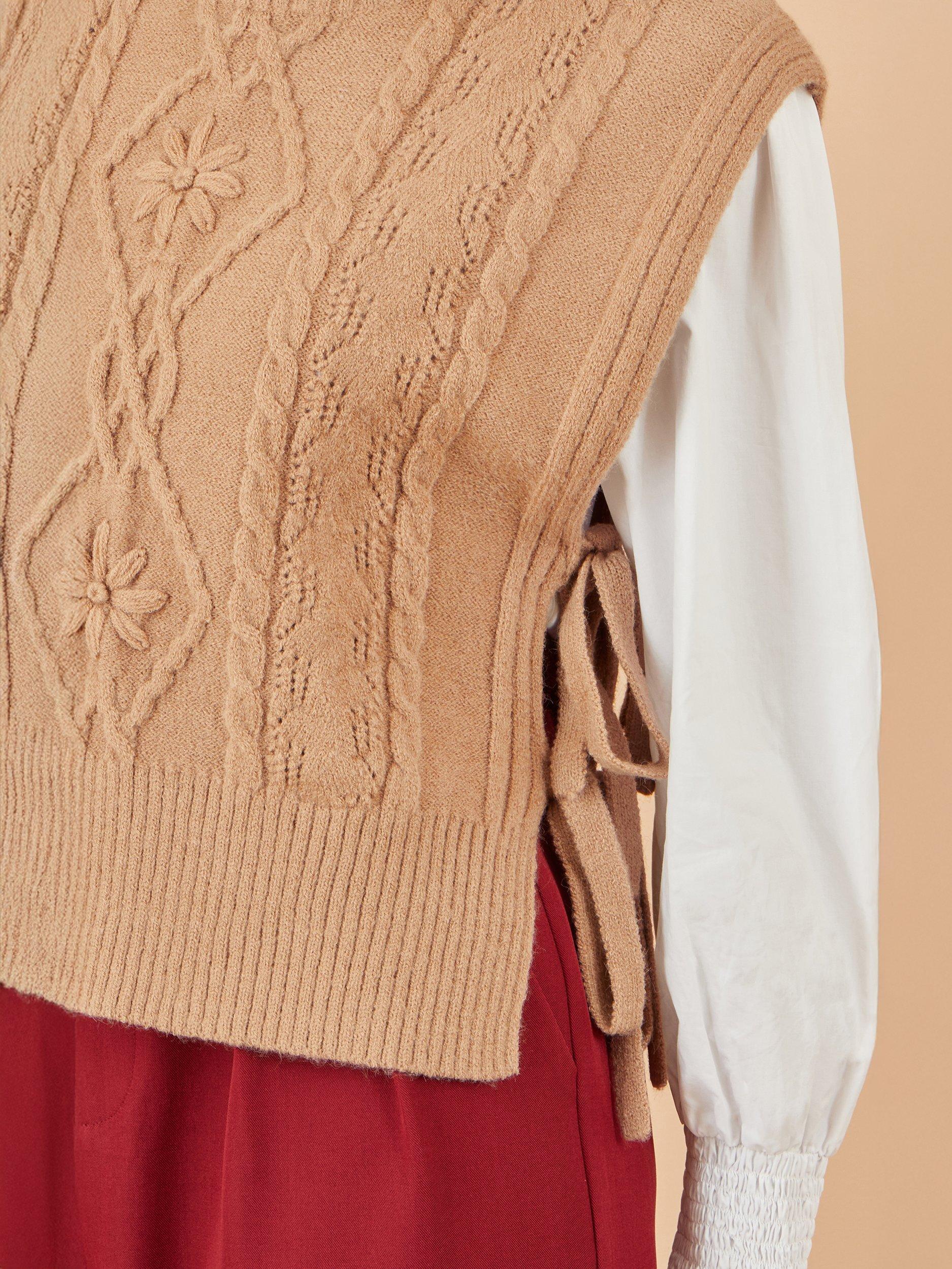 Product image 6 of 6, which shows Yumi Flower Print Cable Knit Tie Side Pullover, Camel, S