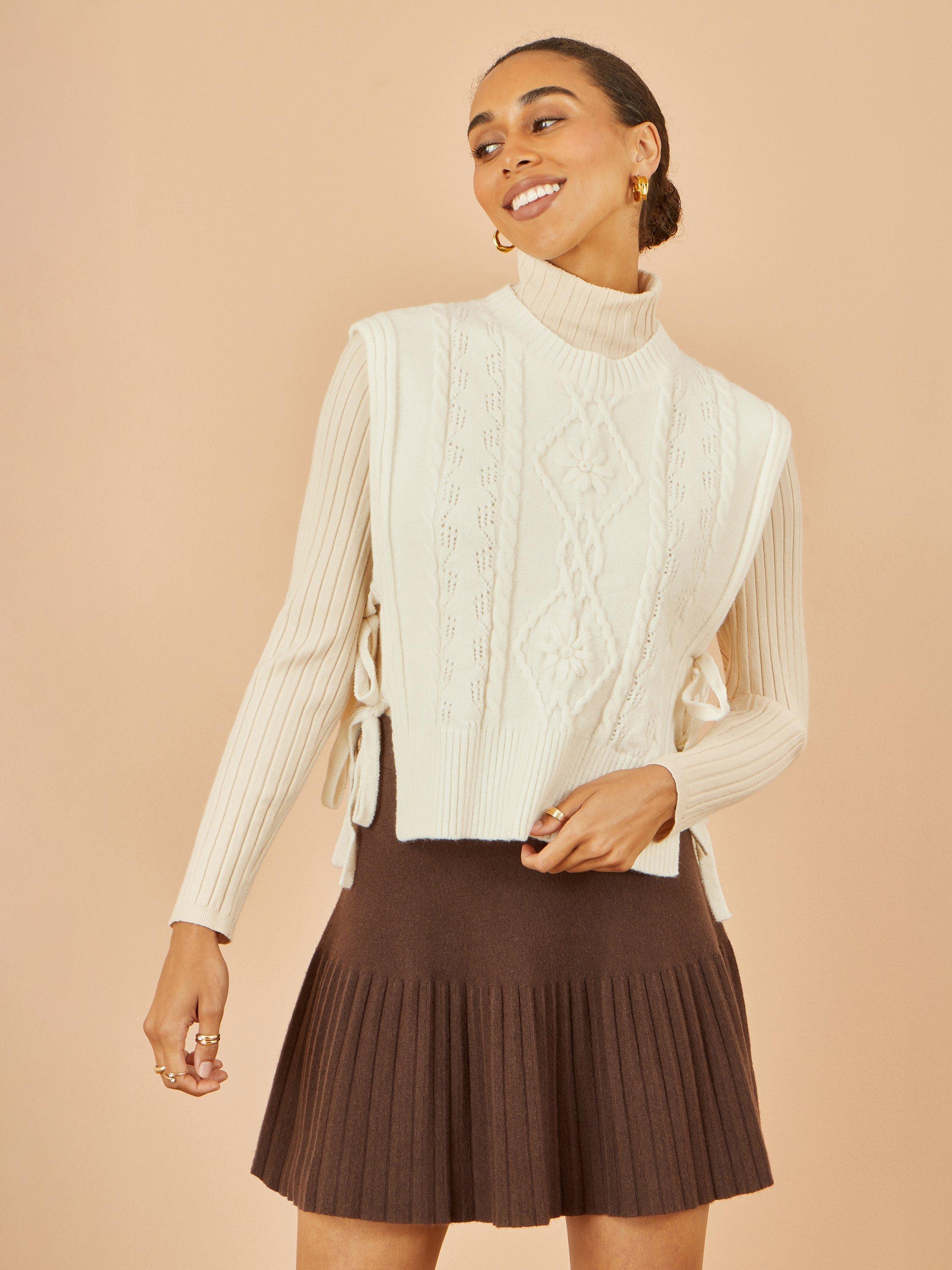 Product image 1 of 5, which shows Yumi Flower Print Cable Knit Tie Side Pullover, Ivory, S