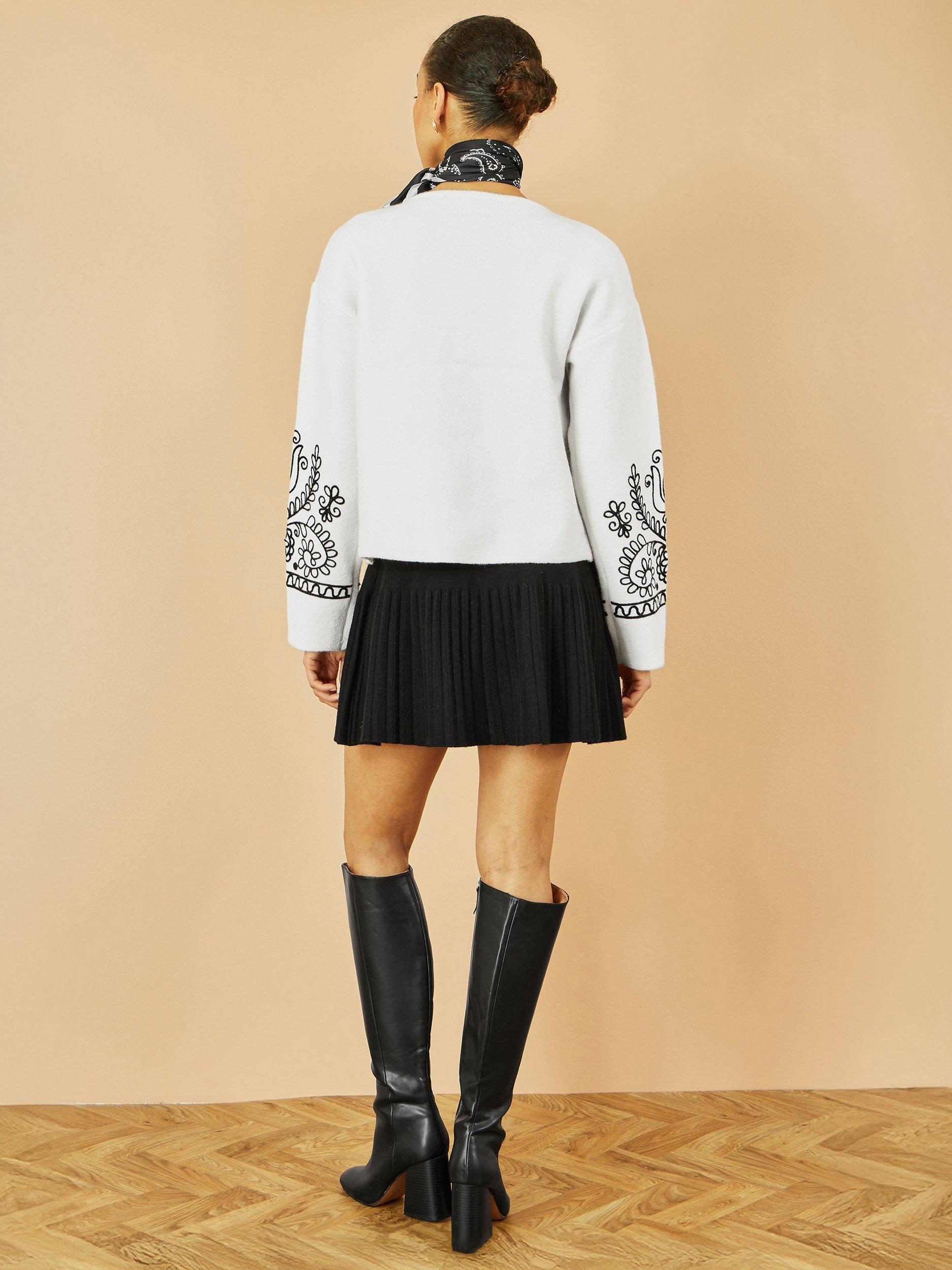 Product image 5 of 5, which shows Yumi Knitted Pleated Mini Skirt, Black, S