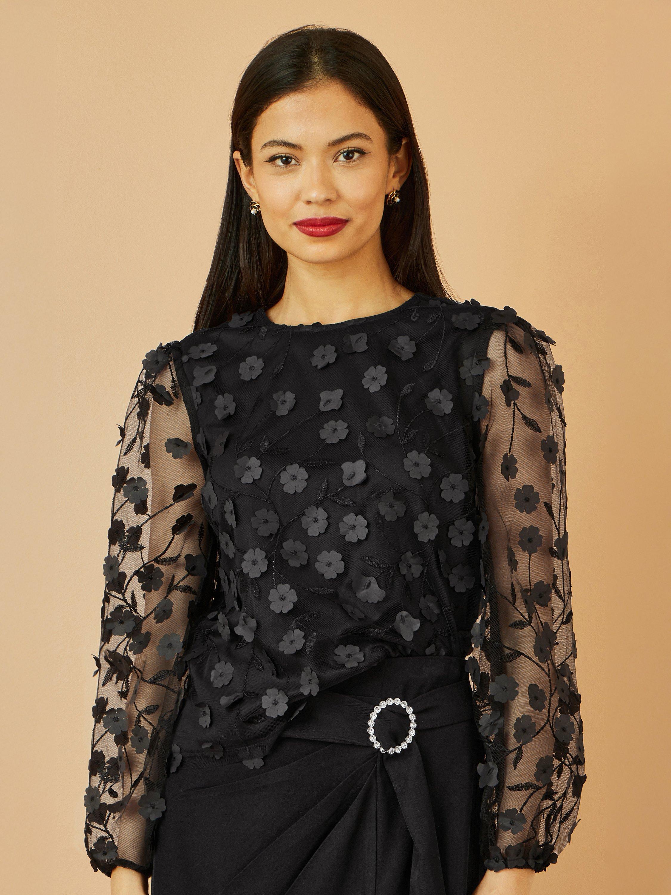 Product image 1 of 4, which shows Yumi Sheer Sleeve Applique Flower Top, Black, 8