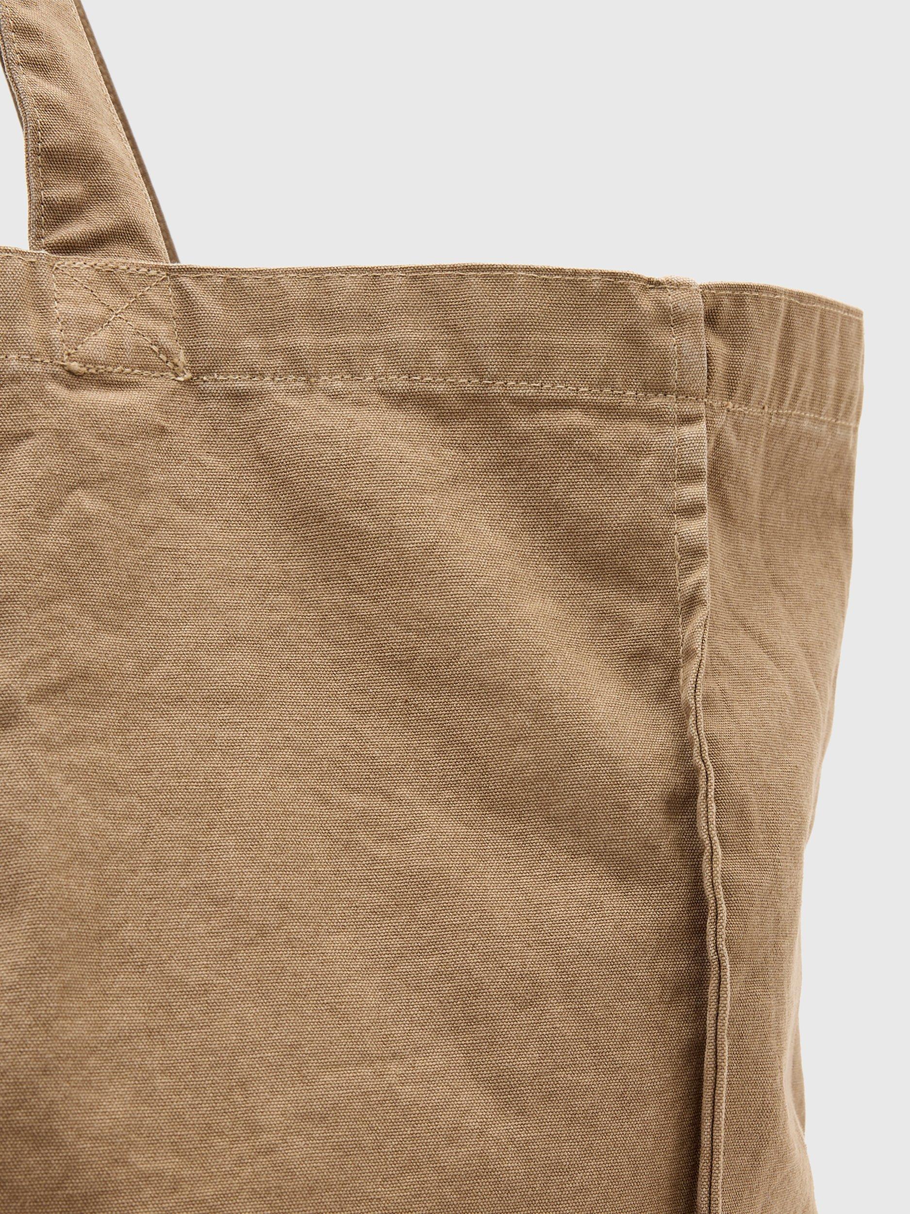 Product image 6 of 8, which shows AllSaints Large Haven Cotton Tote Bag, Pine Bark Brown, One Size