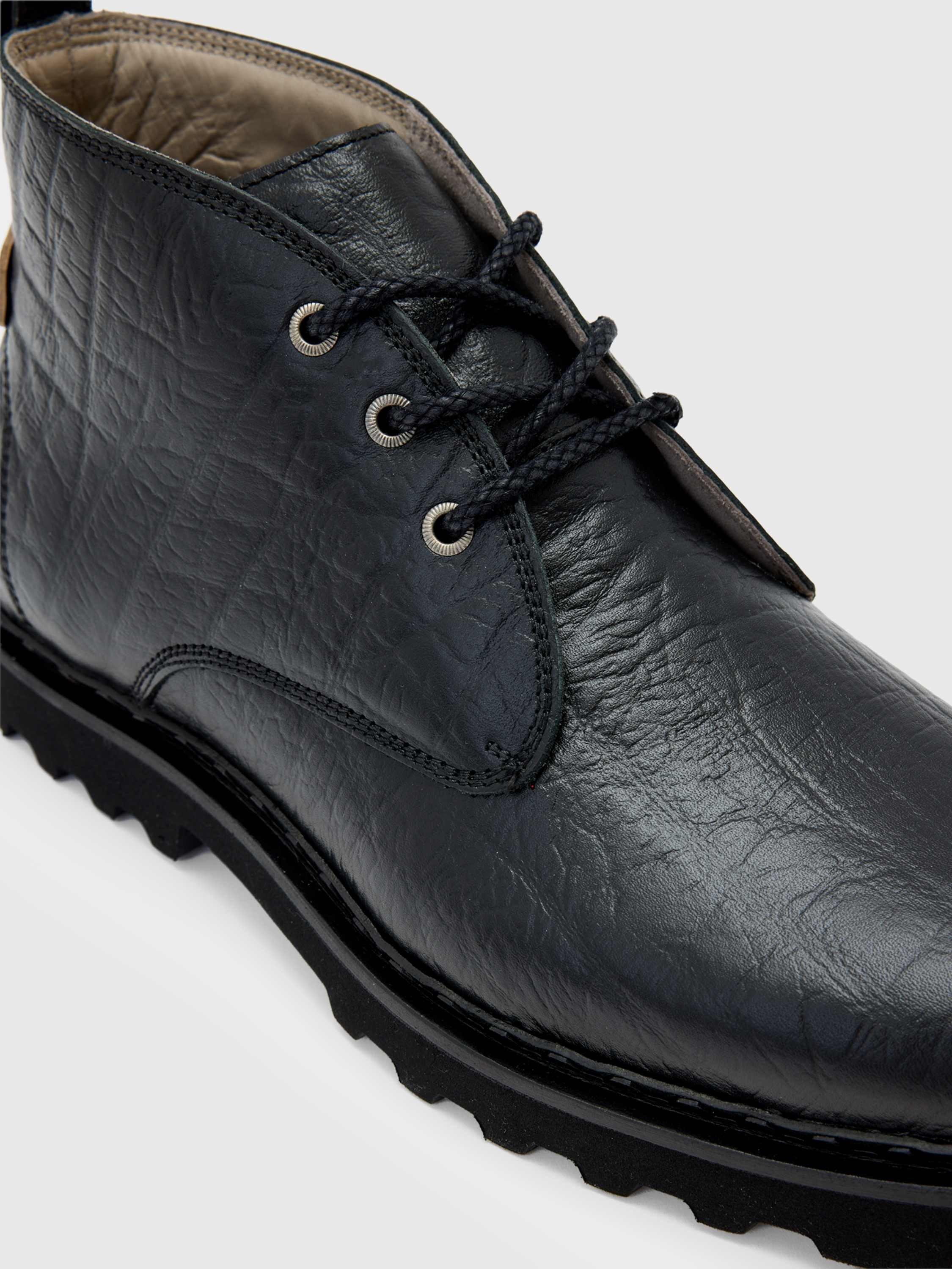 Product image 3 of 5, which shows AllSaints Skiff Mid Leather Ankle Boots, Black, 9