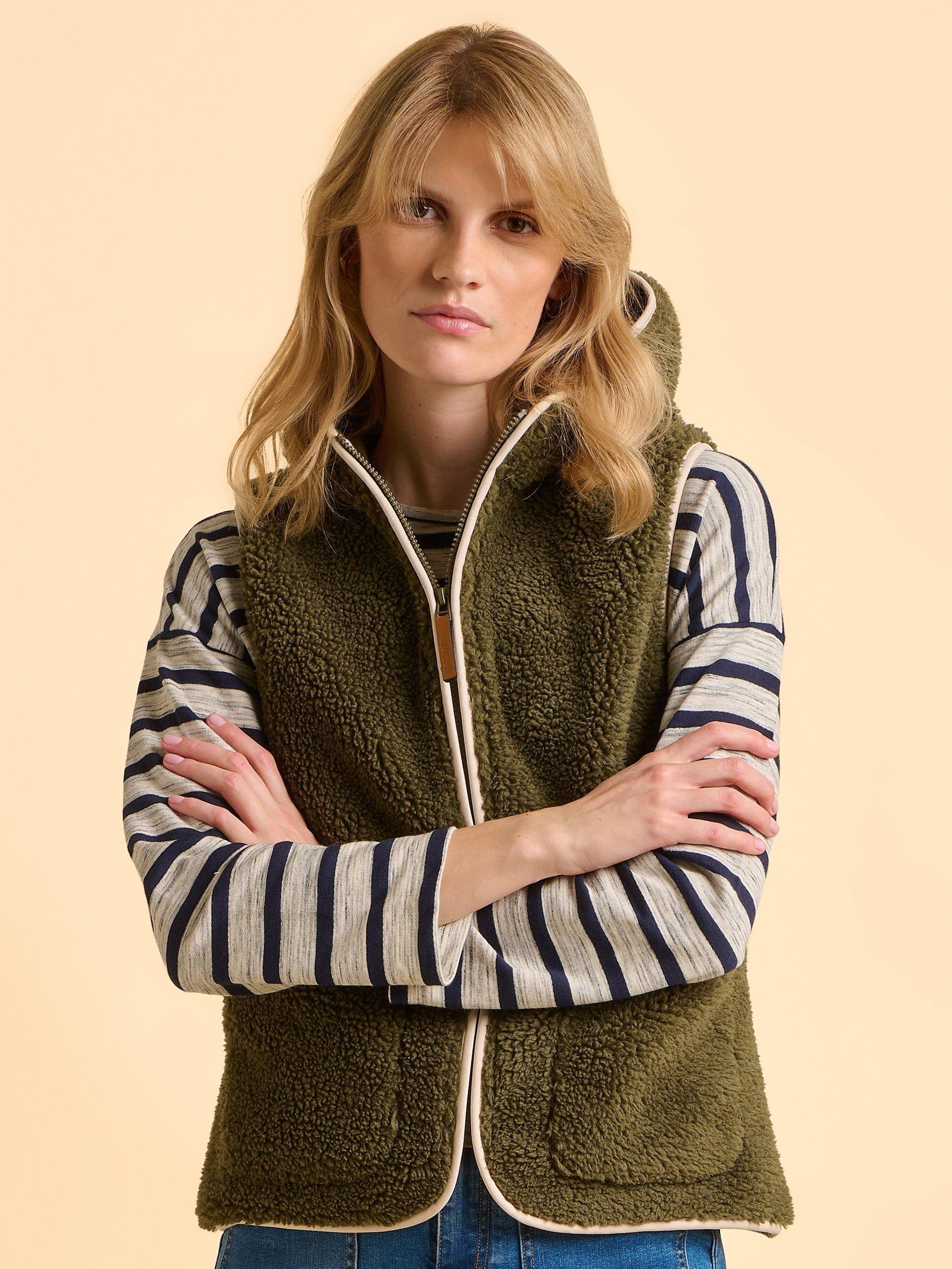 Product image 1 of 6, which shows Brakeburn Snug High Neck Zip Gilet, Green, 8
