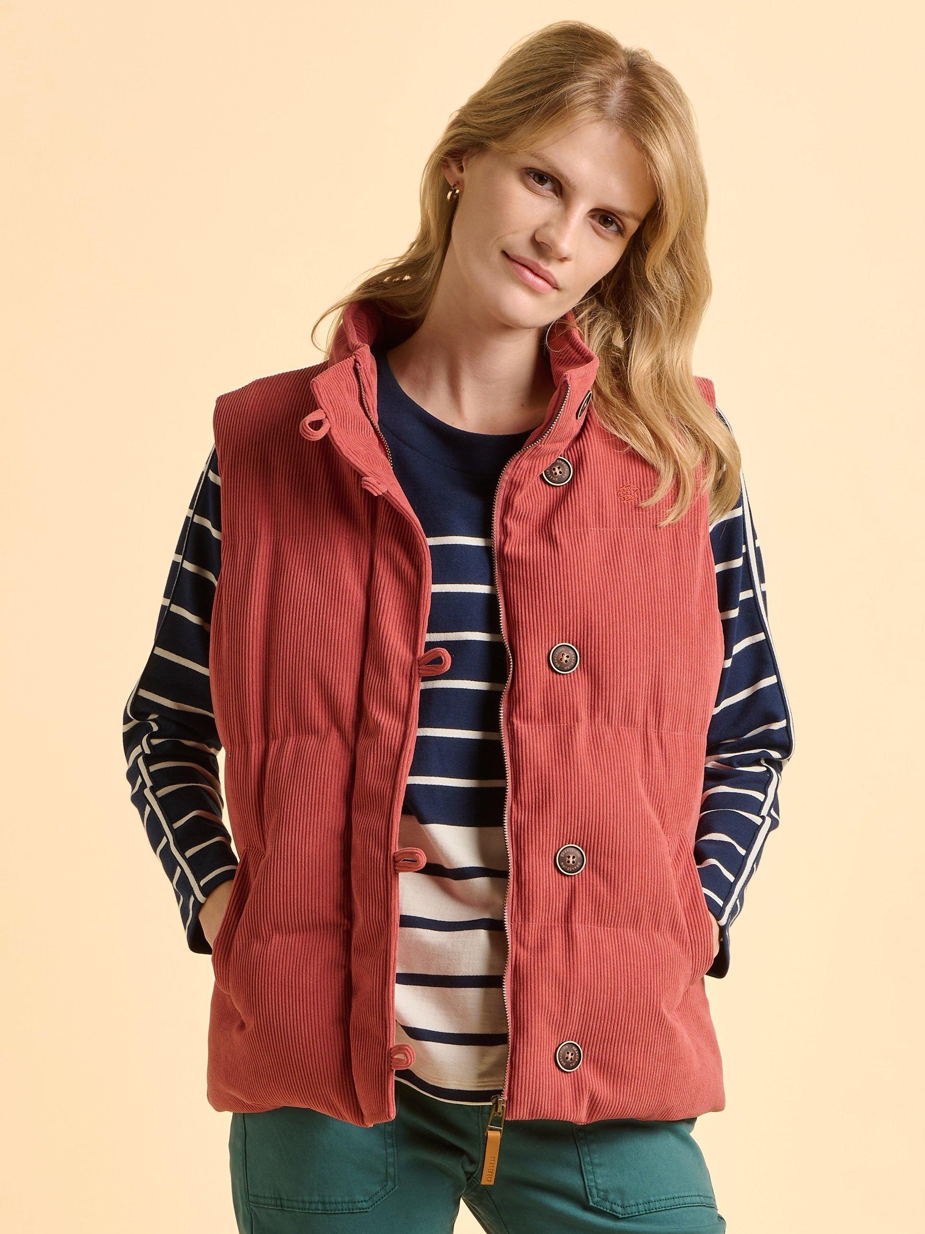 Product image 1 of 6, which shows Brakeburn Wilds High Neck Zip Gilet, Pink, 8