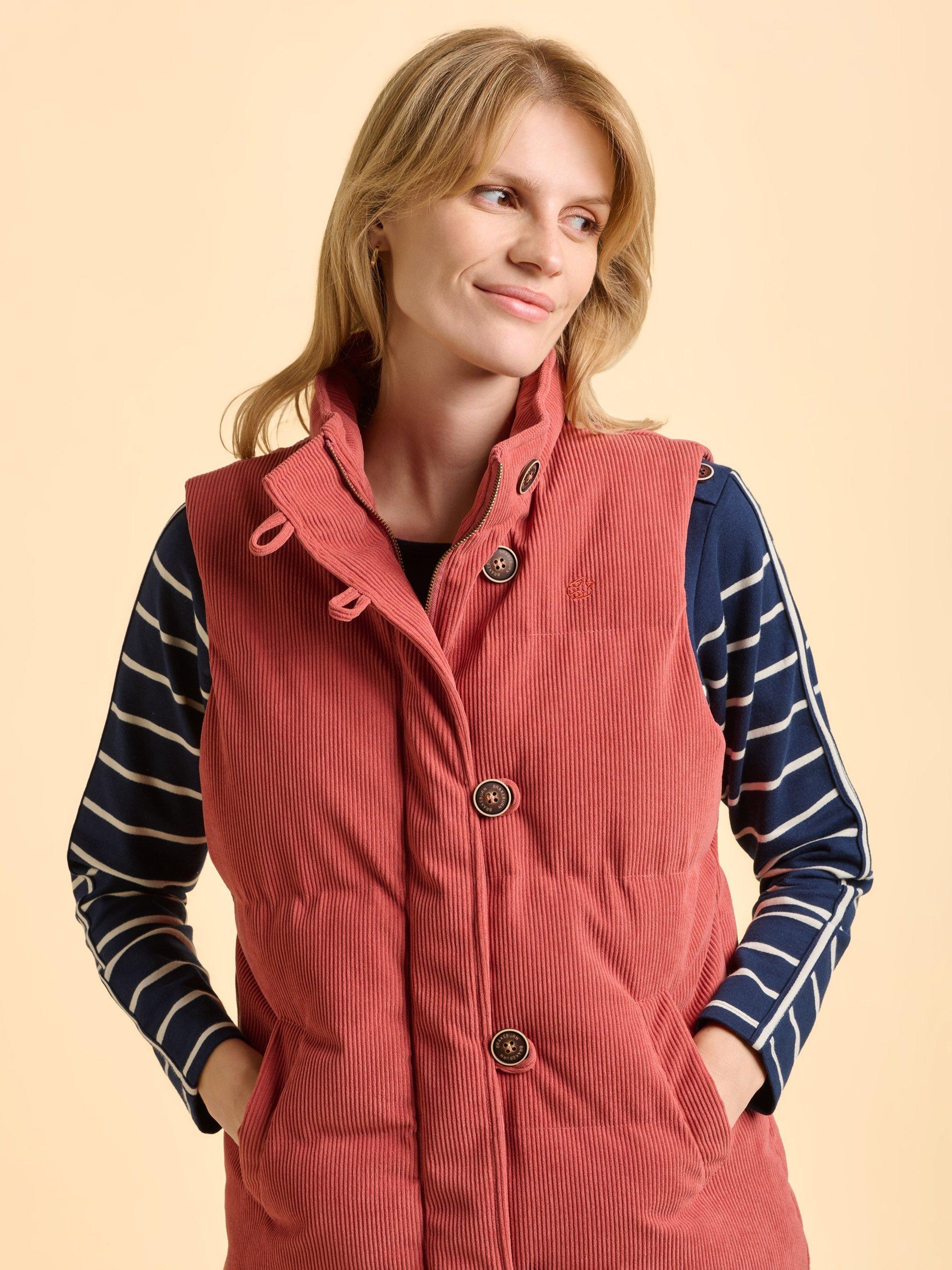 Product image 4 of 6, which shows Brakeburn Wilds High Neck Zip Gilet, Pink, 8