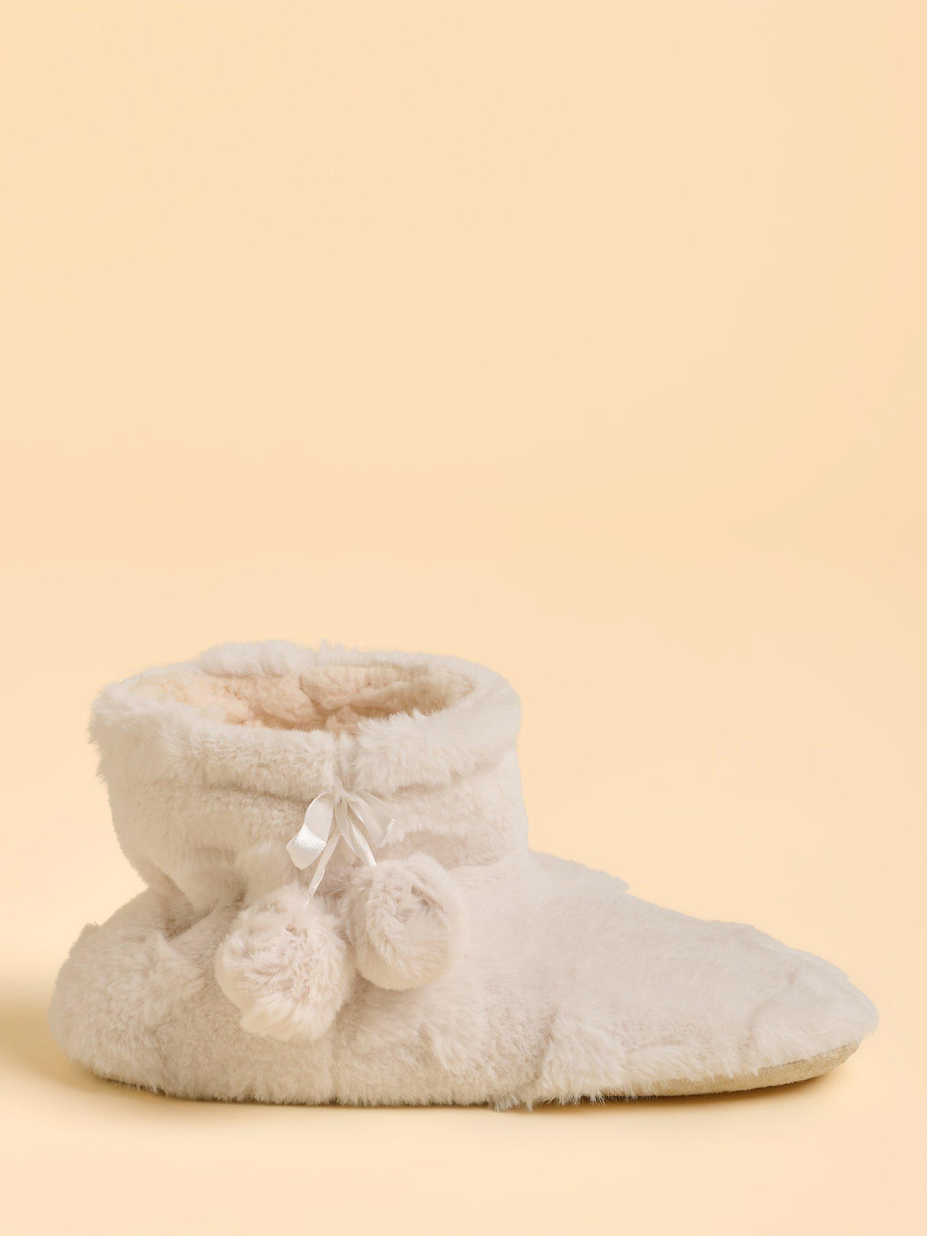 Product image 1 of 5, which shows Brakeburn Cedar Strolls Pom Pom Tassel Slipper Boots, Cream, S