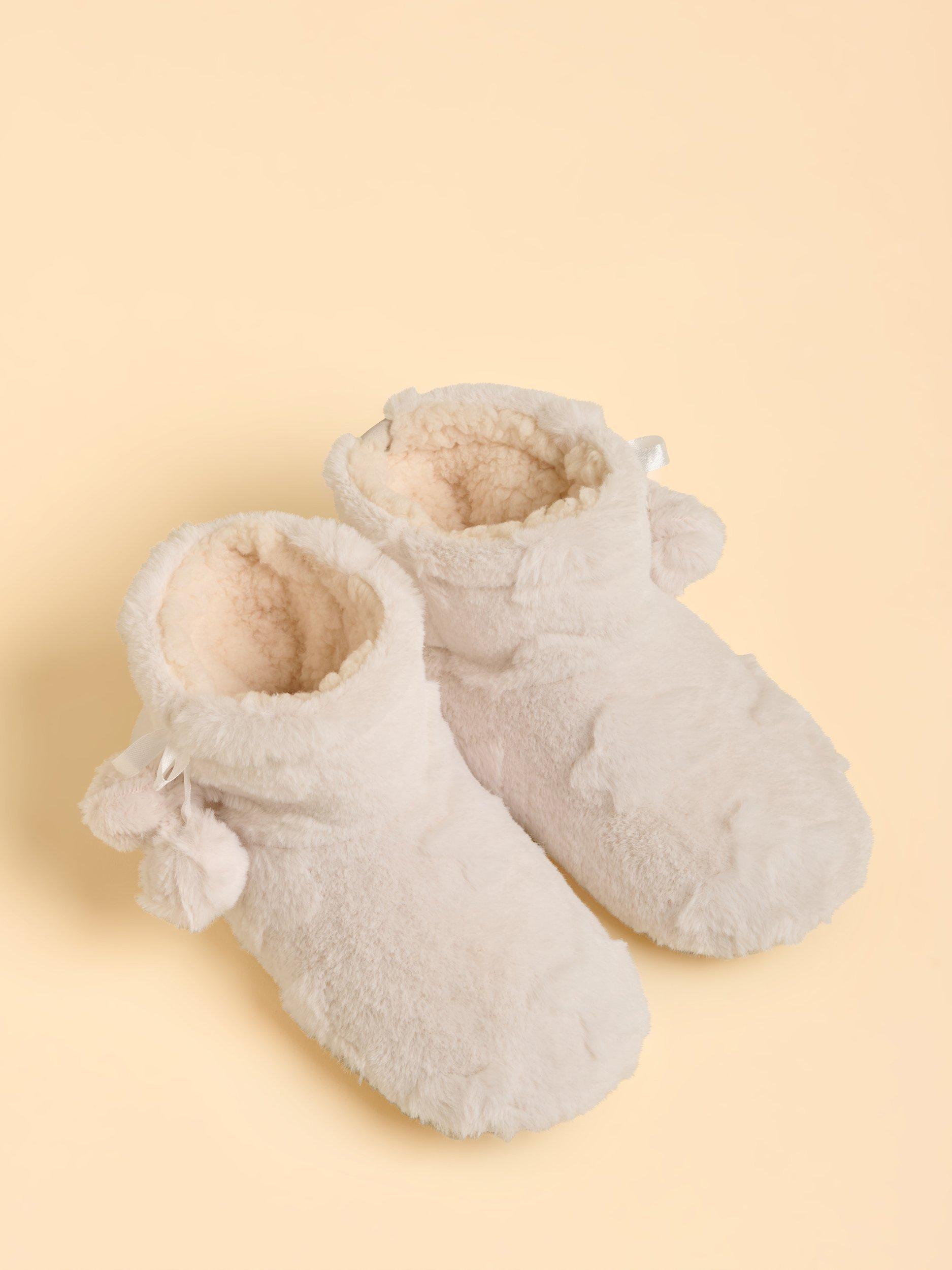 Product image 4 of 5, which shows Brakeburn Cedar Strolls Pom Pom Tassel Slipper Boots, Cream, S