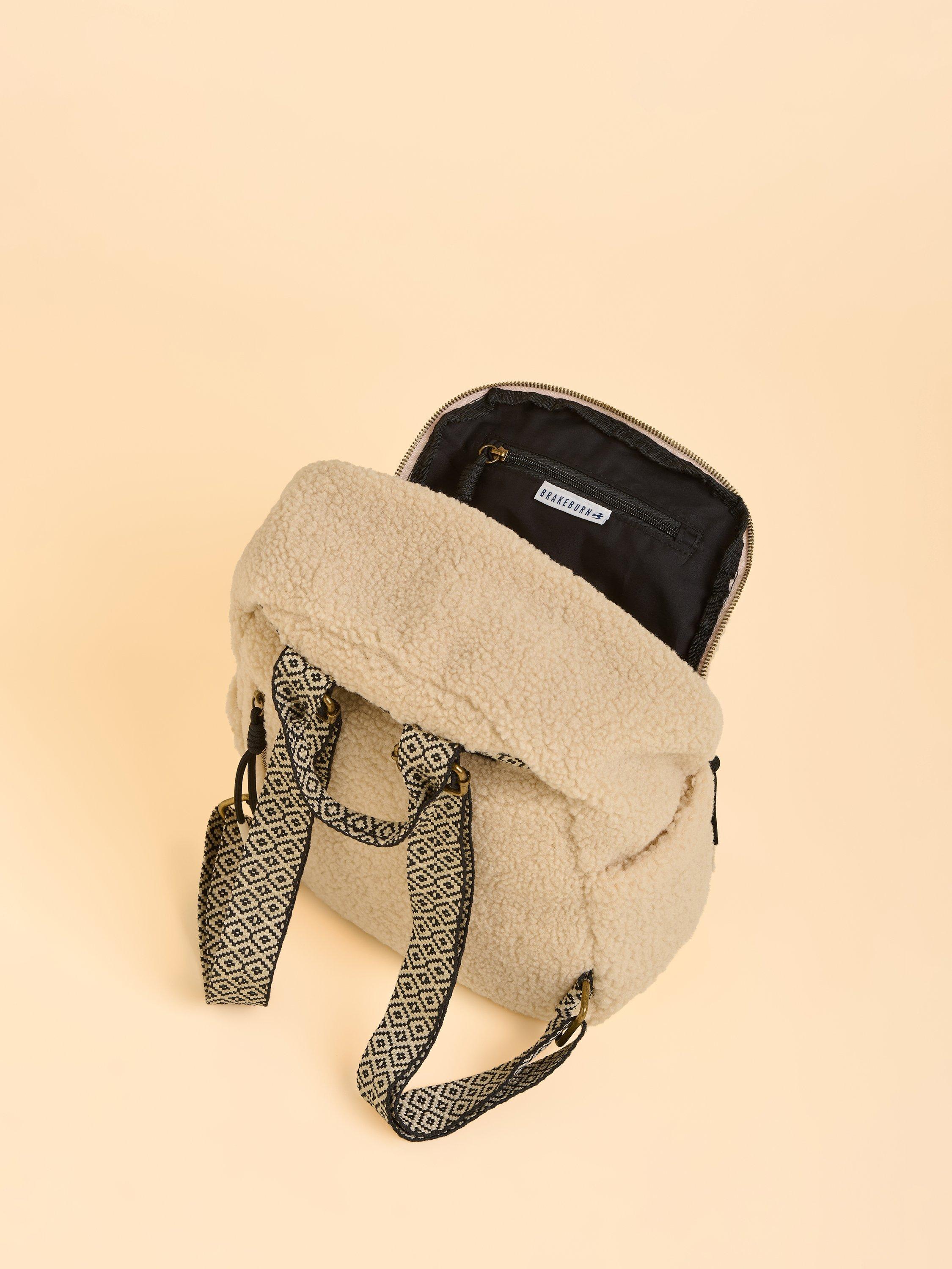 Product image 3 of 4, which shows Brakeburn Ope Teddy Fleece Backpack, Cream