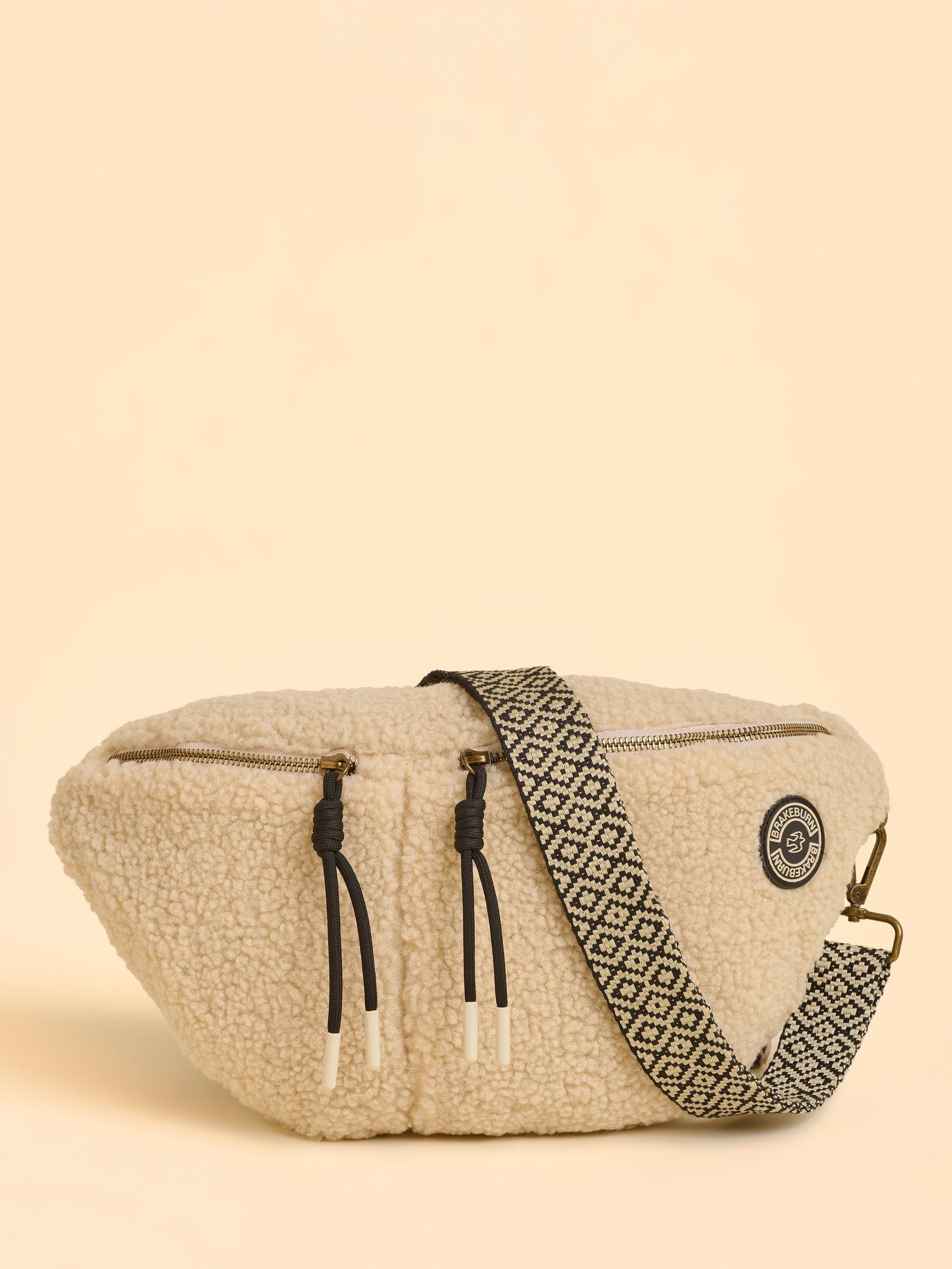 Product image 1 of 4, which shows Brakeburn Ope Teddy Fleece Sling Bag, Cream