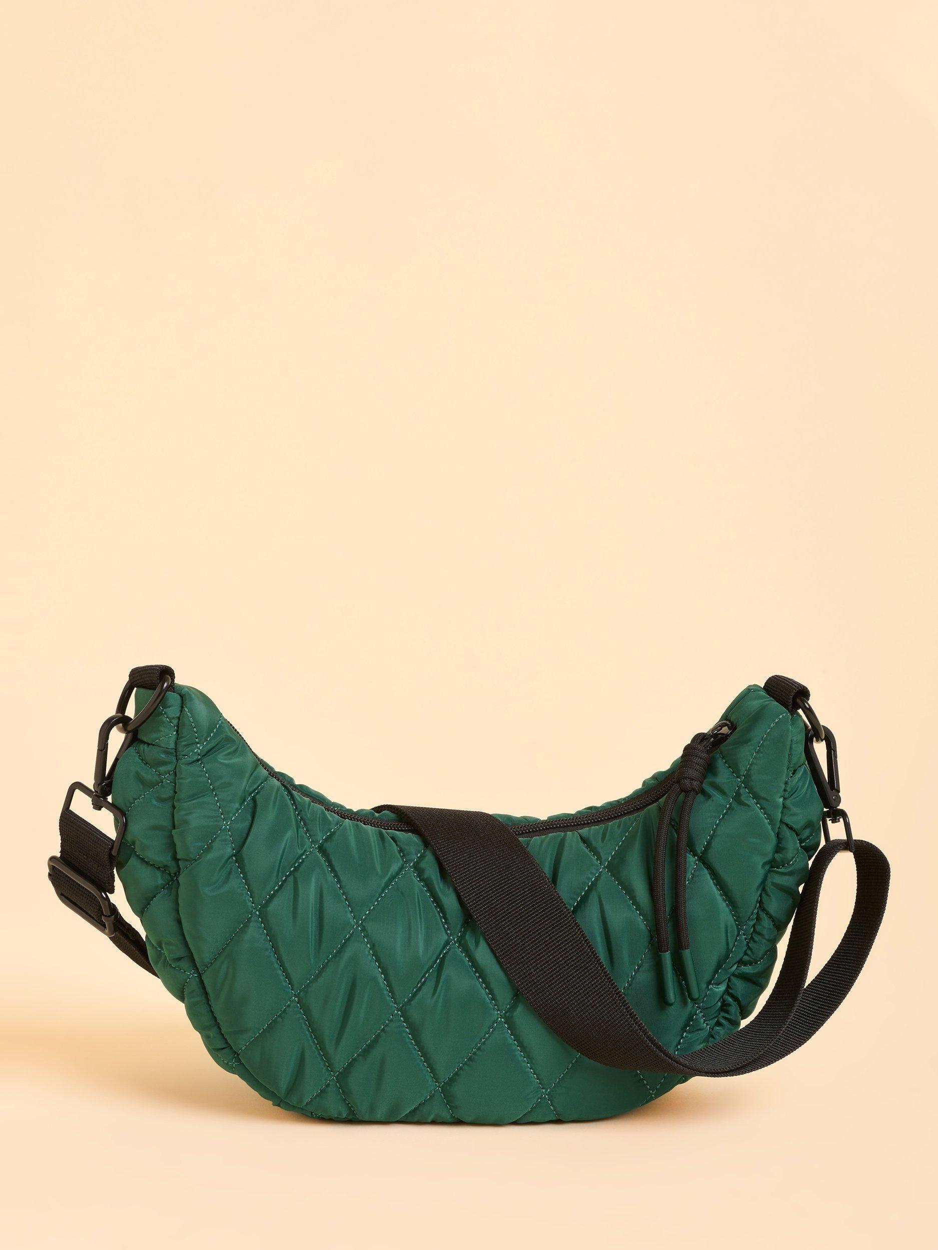 Product image 1 of 4, which shows Brakeburn Shipstal Quilted Sling Bag, Teal, One Size
