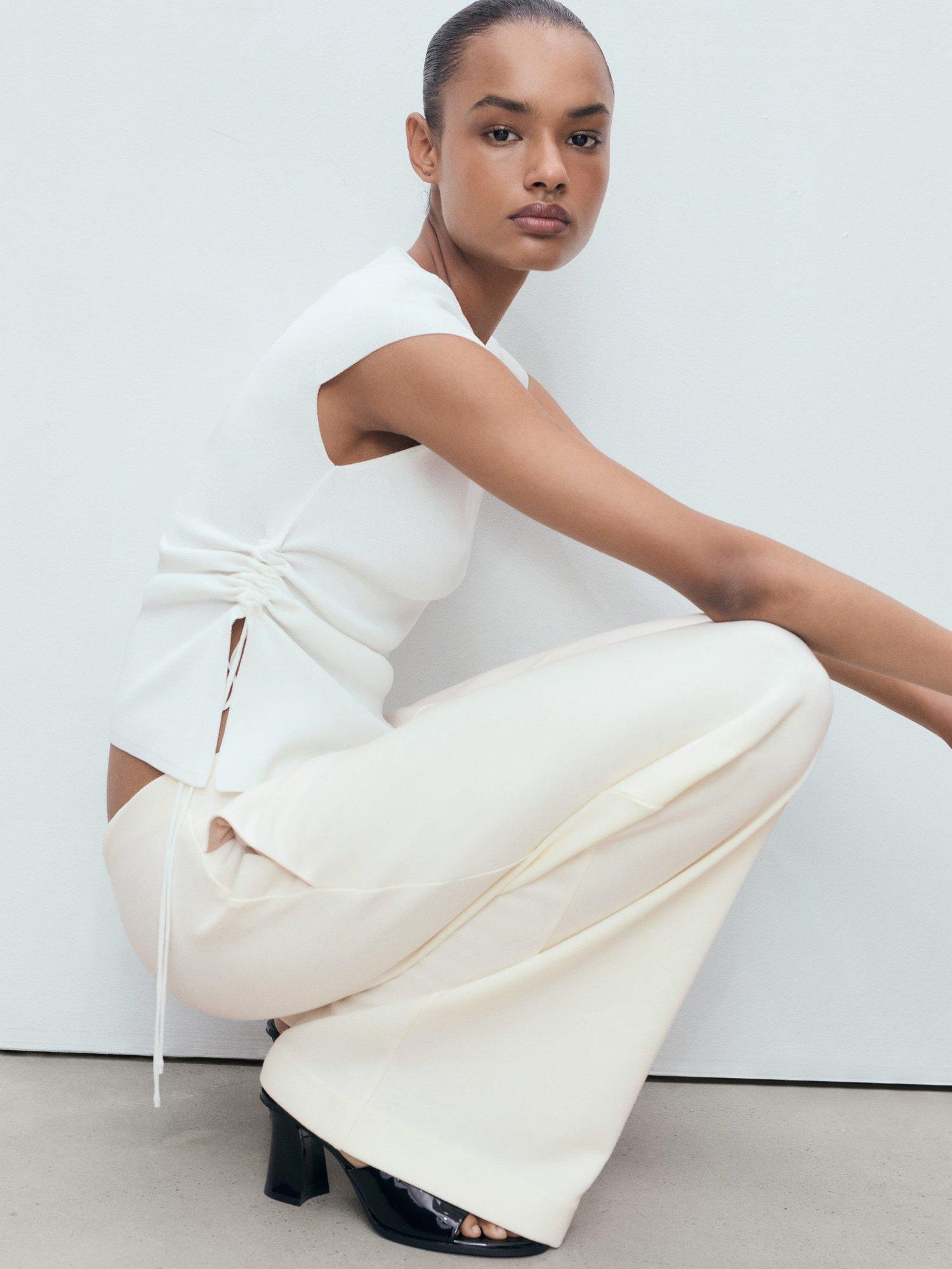 Product image 6 of 7, which shows Mango Pico Tailored Wide Leg Trousers, Cream, L