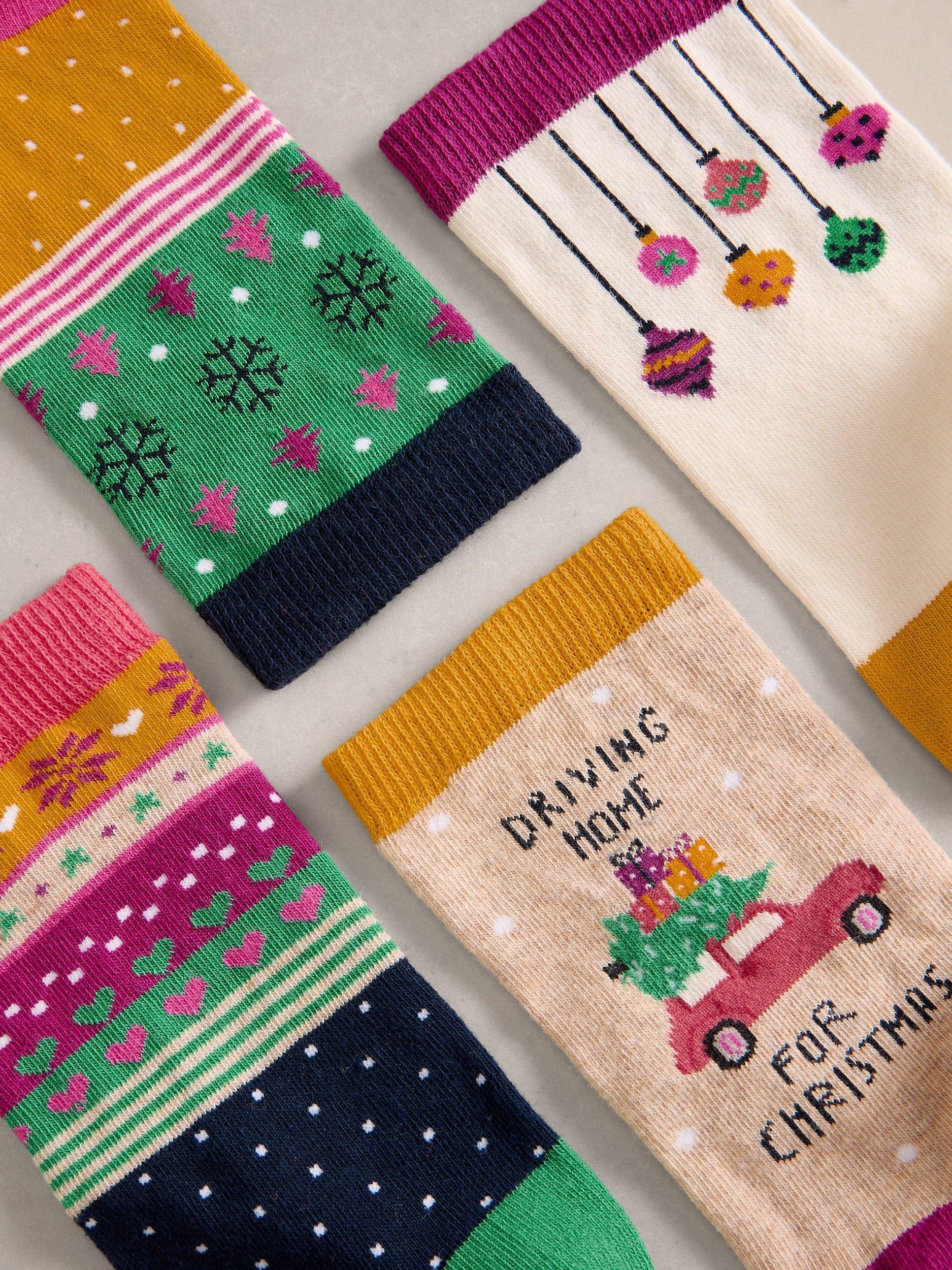 Product image 2 of 4, which shows White Stuff Christmas Ankle Socks, Pack of 4, Multi, 3-5.5