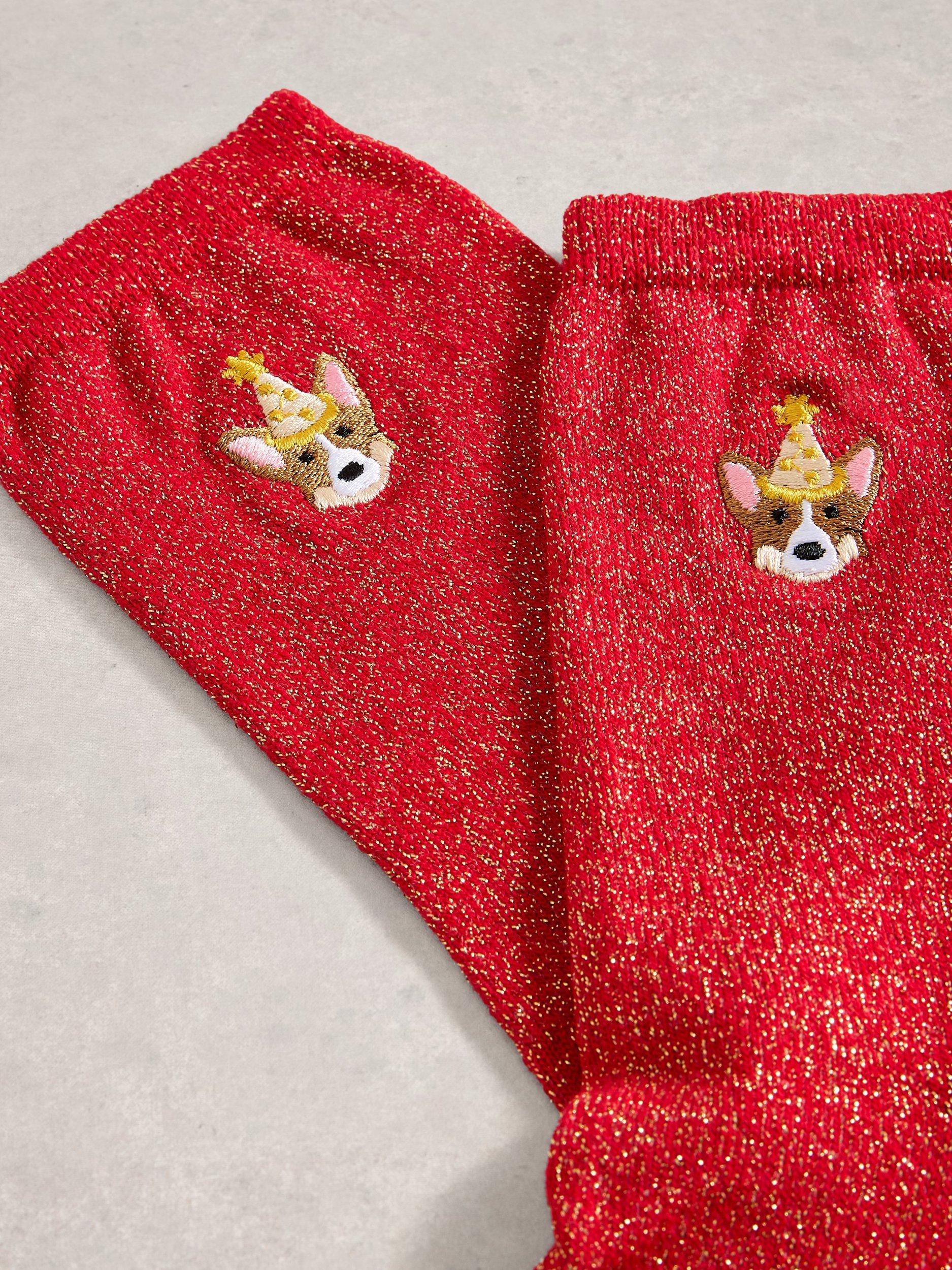 Product image 2 of 2, which shows White Stuff Embroidered Corgi Sparkle Ankle Socks, Bright Red, 3-5.5