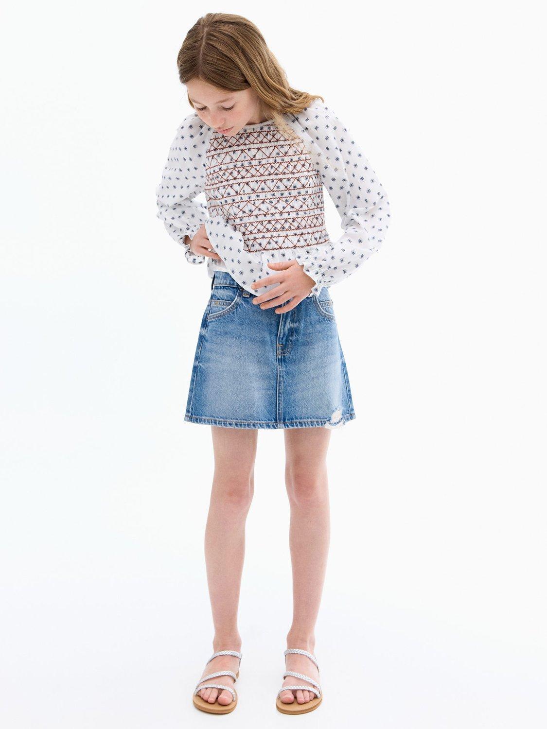 Product image 6 of 7, which shows Mango Kids' Stella Denim A-Line Mini Skirt, Mid Blue, 9 years