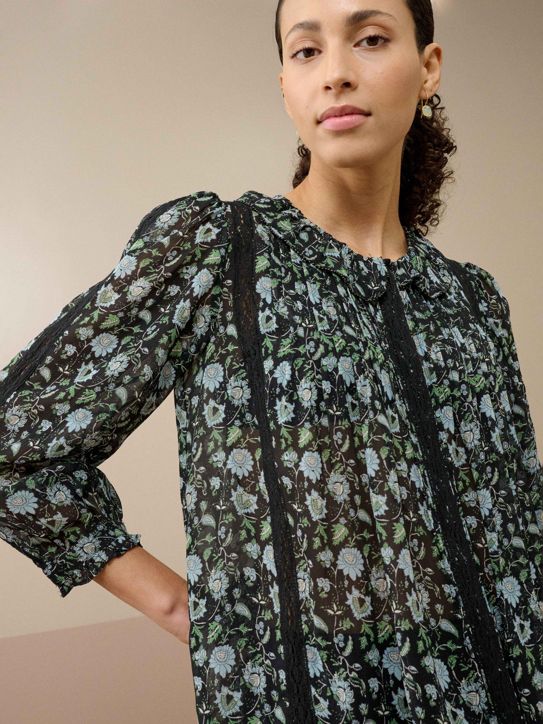 Product image 2 of 4, which shows Brora Silk Floral Three-Quarter Sleeves Round Neck Blouse, Black/Wedgewood, 8