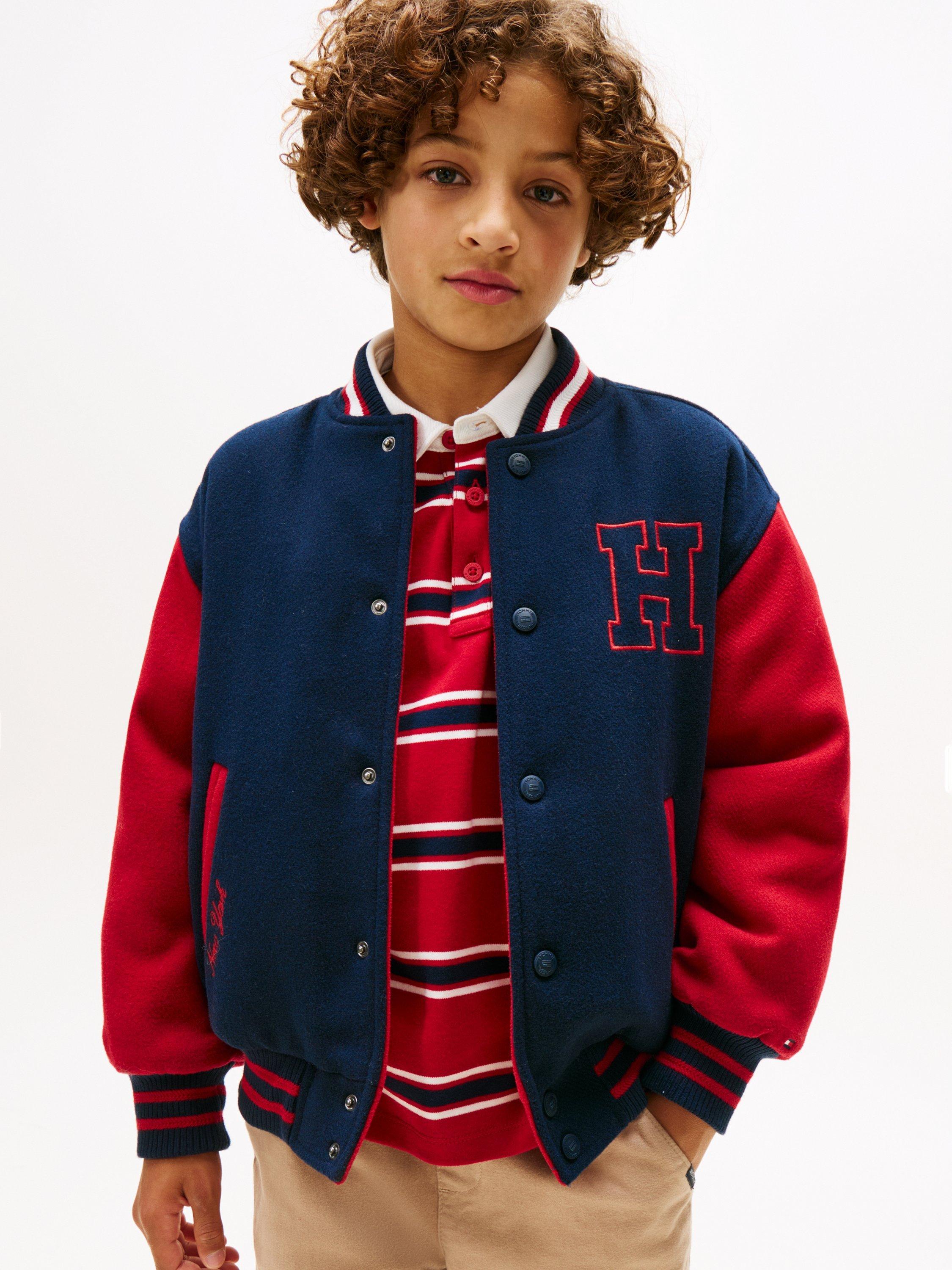 Product image 1 of 4, which shows Tommy Hilfiger Kids' Reversible Relaxed Bomber Jacket, Dark Night Navy, 3 years