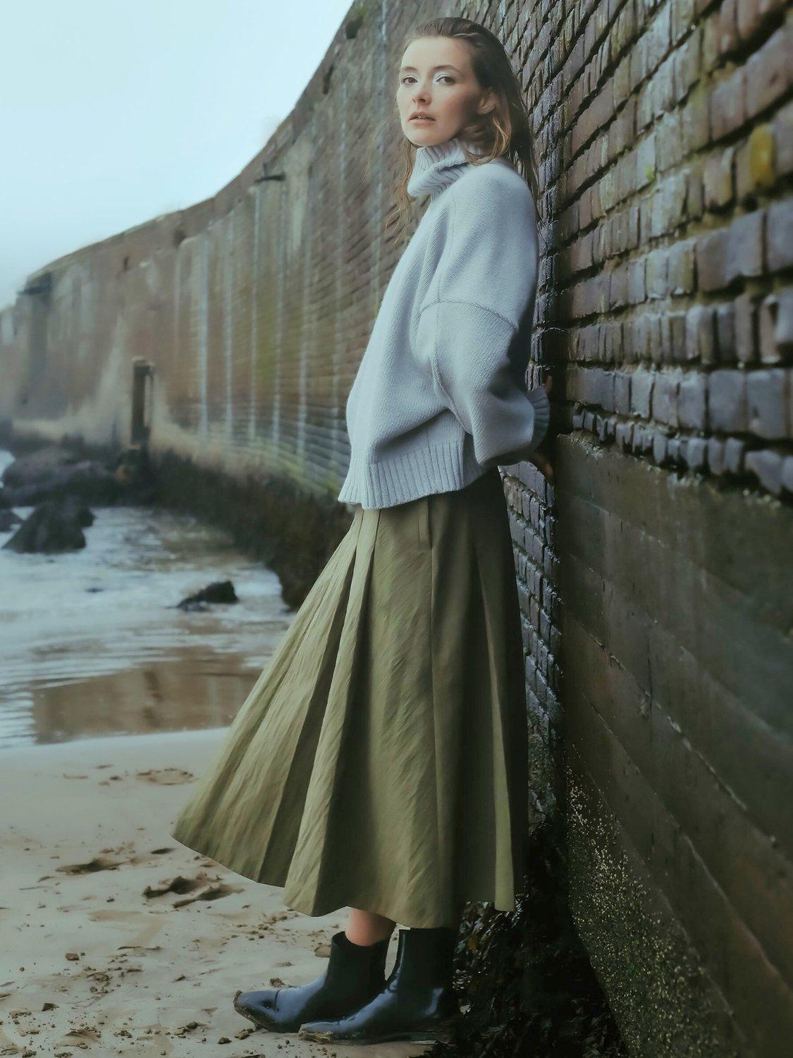 Product image 6 of 6, which shows EAST 42ND Box Pleated Belt Loop Midi Skirt, Khaki, M