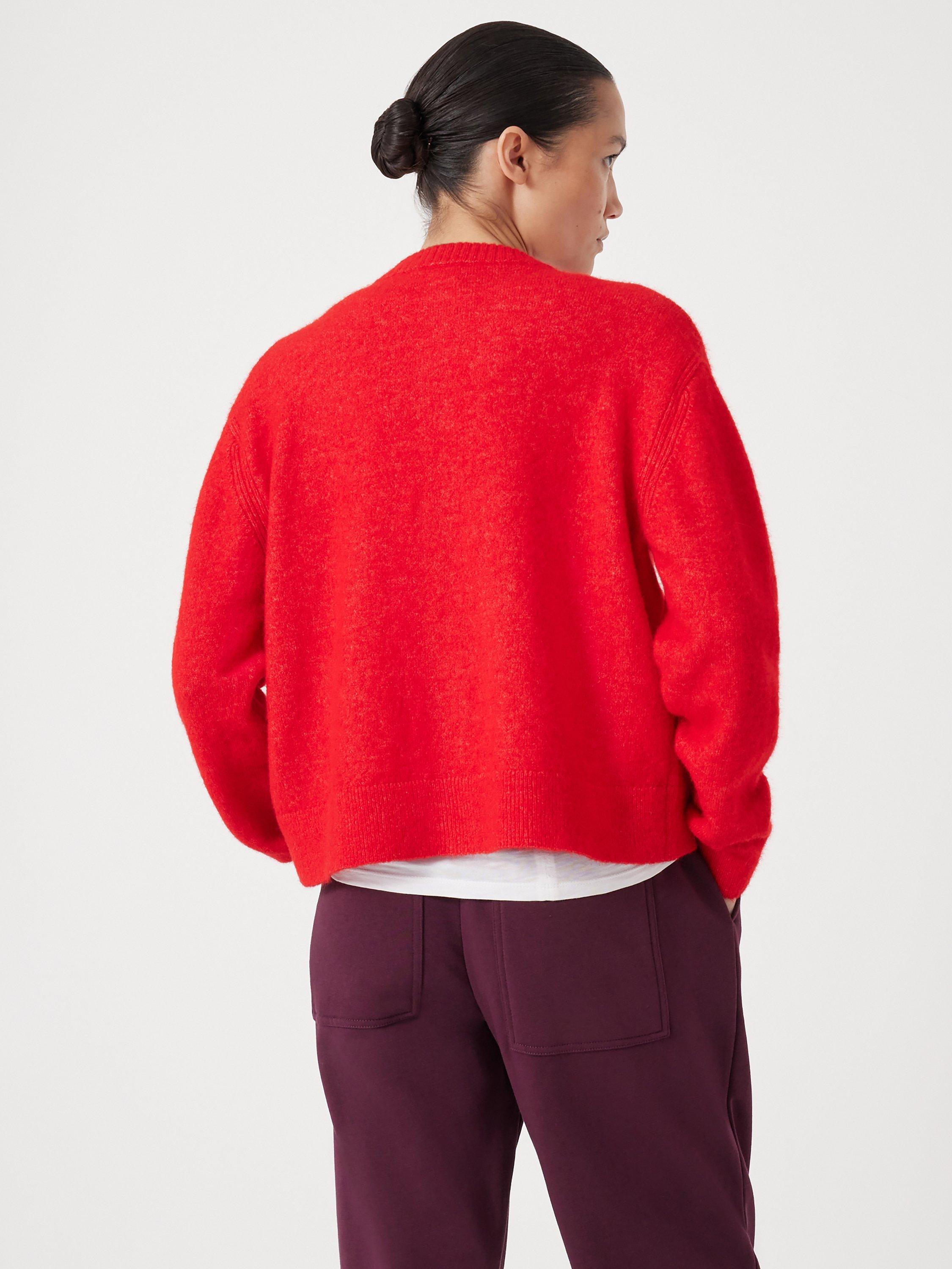 Product image 4 of 5, which shows HUSH Juni Crew Neck Wool Rich Cardigan, Fiery Red, M-L