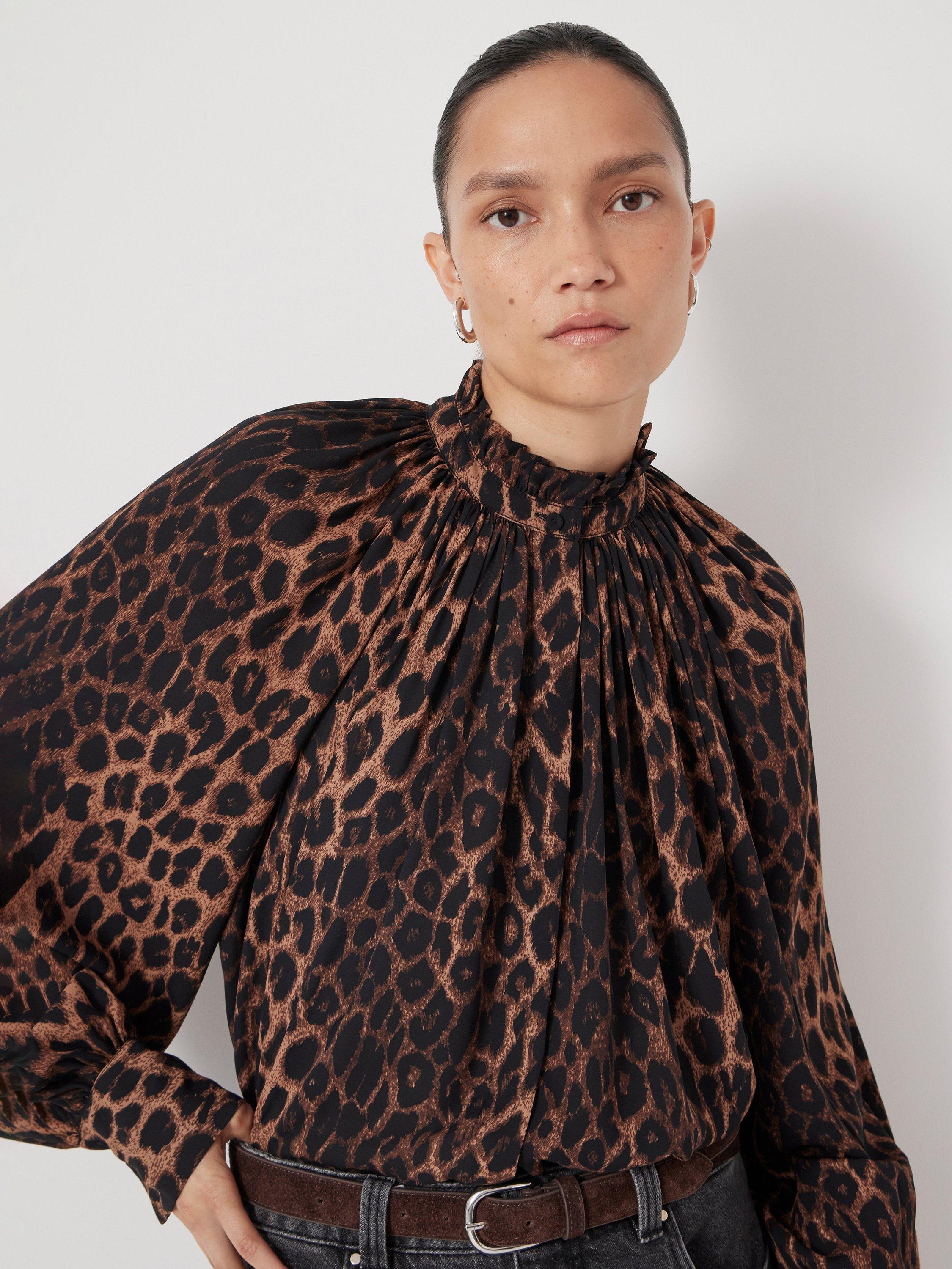 Product image 1 of 7, which shows HUSH Fleur Leopard Print Long Sleeve High Neck Blouse, Natural/Brown, XXS