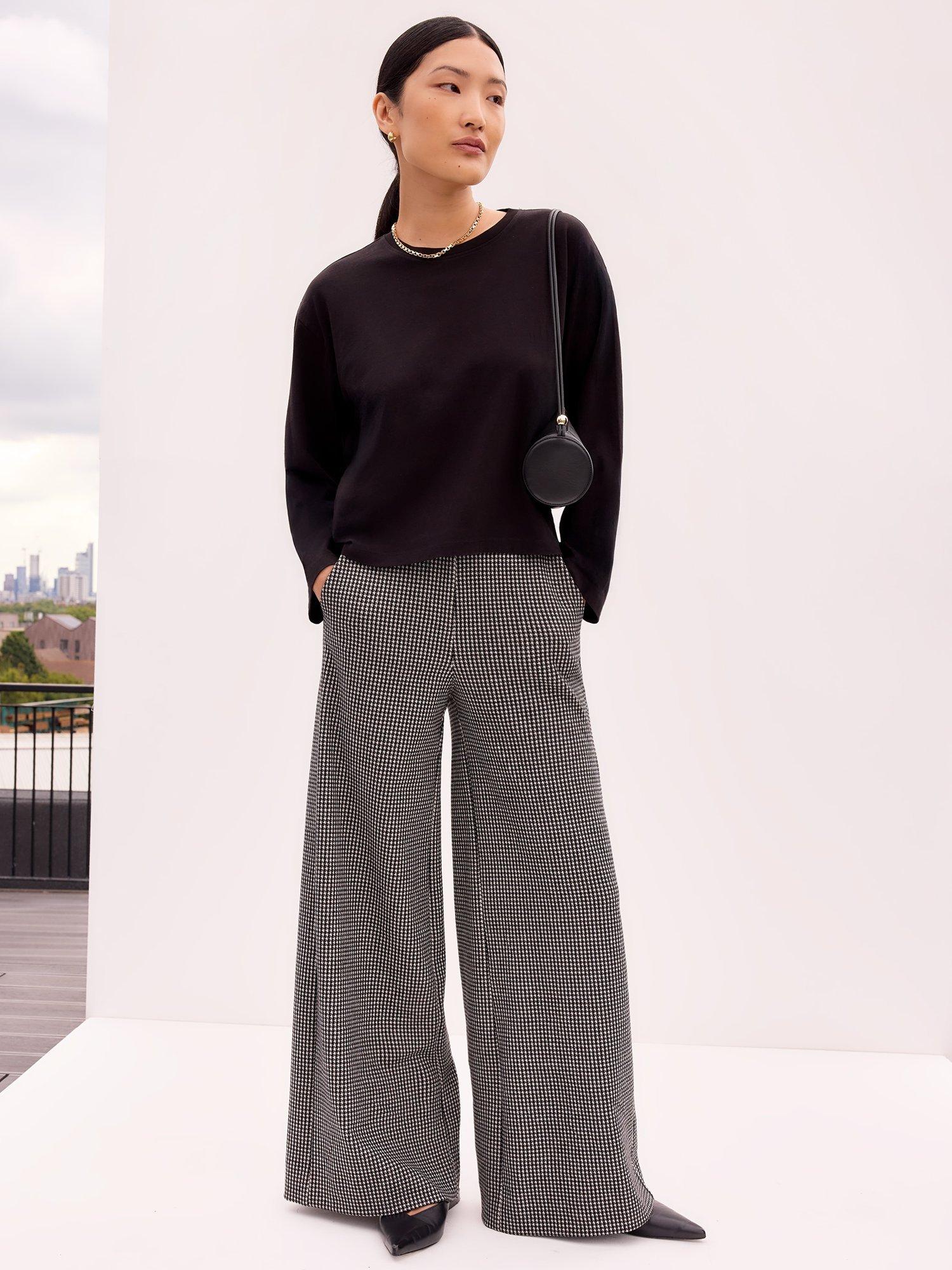 Product image 1 of 3, which shows Ro&Zo Ultimate Long Sleeve Top, Black, XS